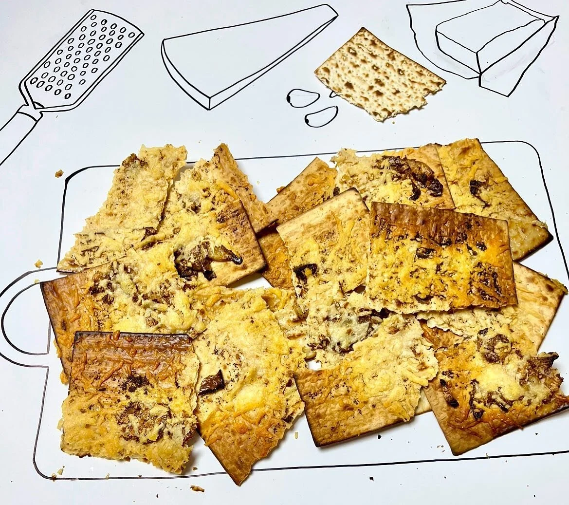 Matzah Parm Crostini-the bread of affliction no more! Crispy, crunchy, savory -perfect with a glass of wine. Rather easy to concoct-make a double batch because these snackies go fast.  Ridiculously addictive.
1 stick of butter
10-12 cloves of garlic