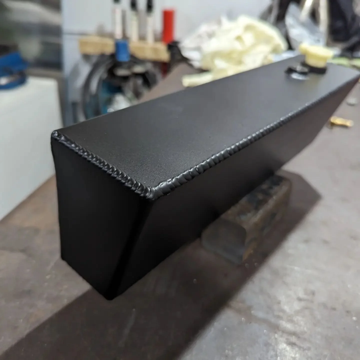 Custom brake vacuum reservoir for a 66 Mustang. 

Large cams can kill the vacuum on a motor which stops the brake booster from working correctly. A simple fix is to install a vacuum reservoir which stores the highest created vacuum at deceleration an