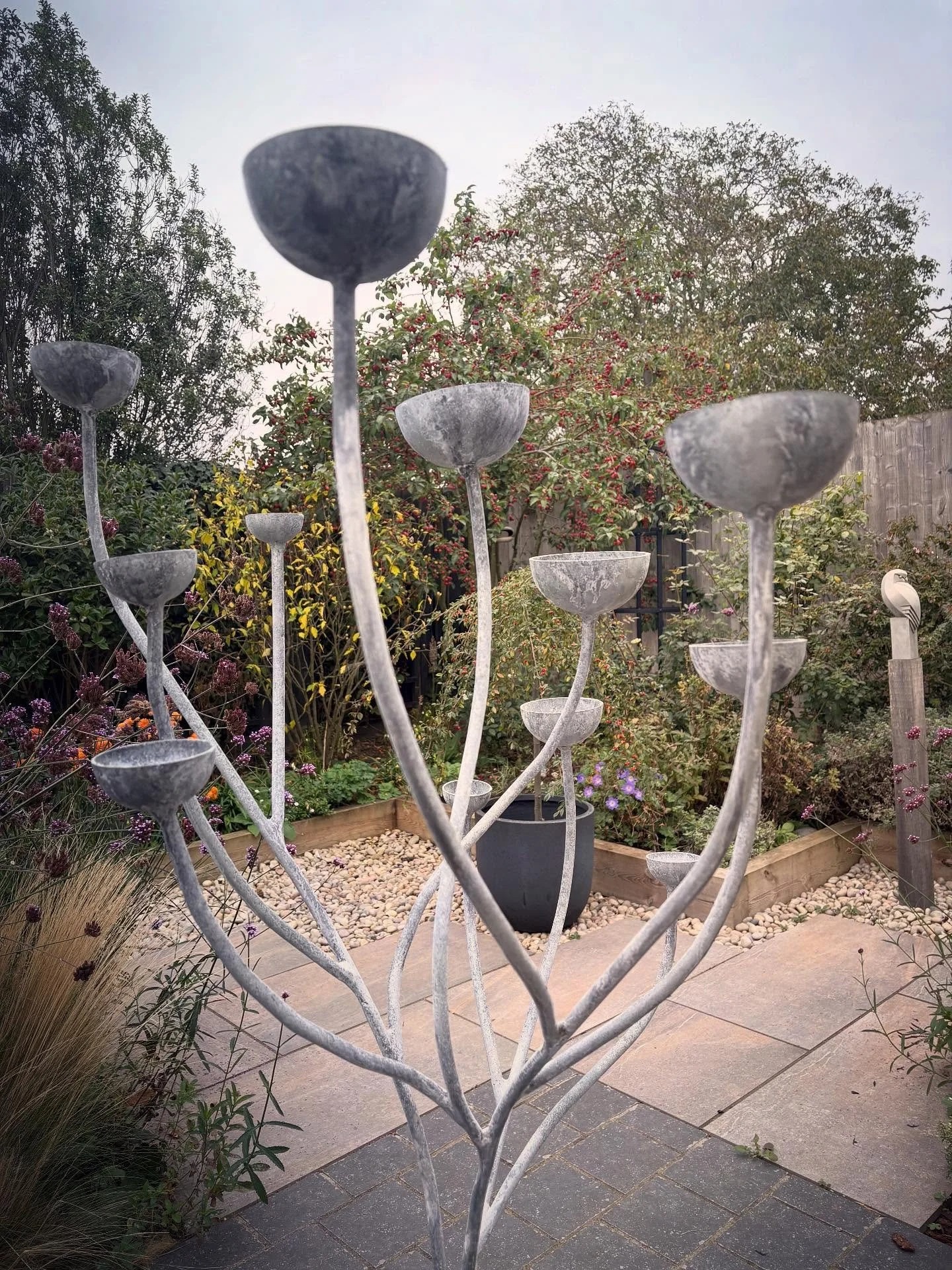 Nice to see this water catcher sculpture made last year while installing my recent Arch. #garden #sculpture #watercatcher #rain #gardendesign #gardenironwork