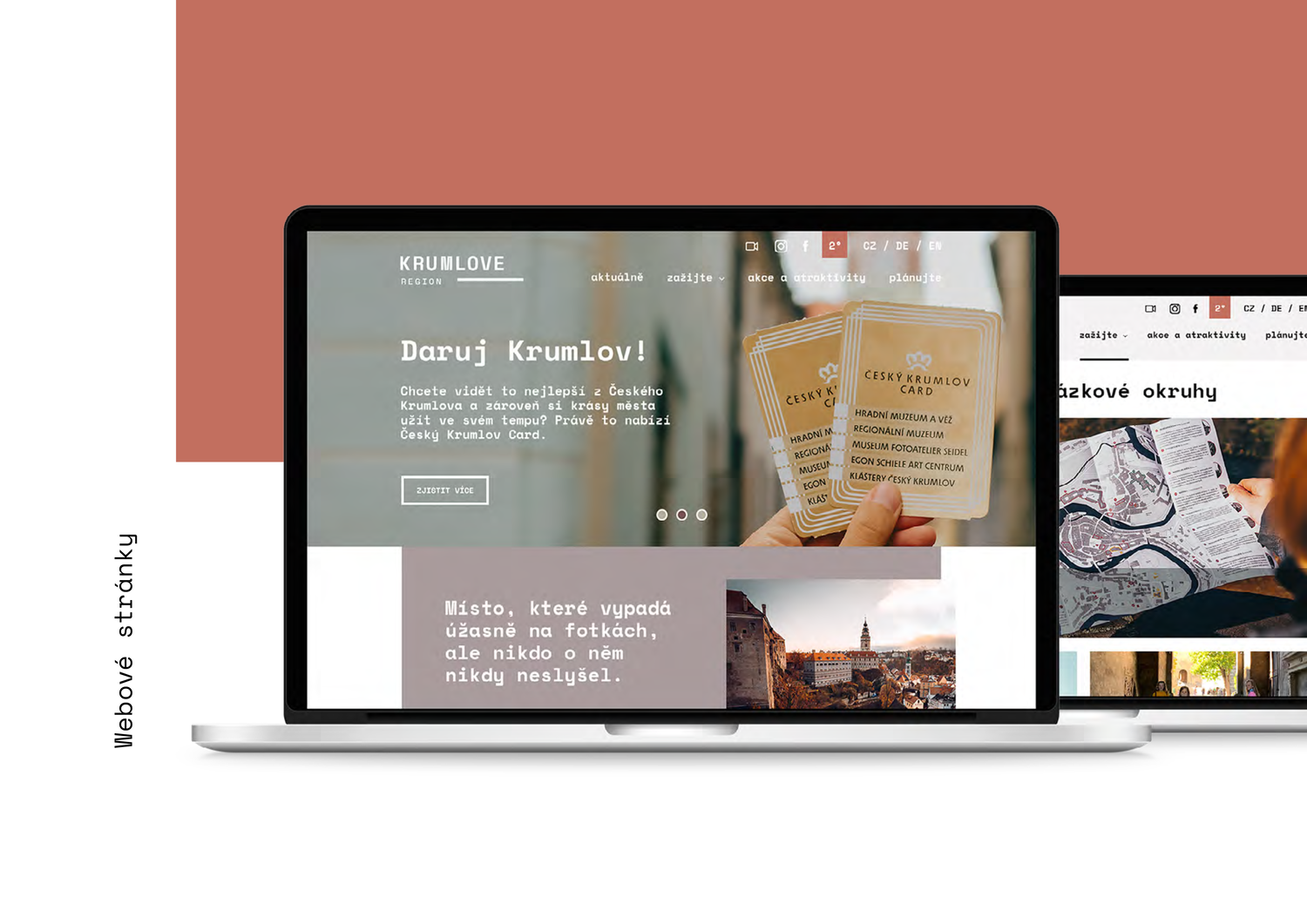 A laptop displaying a website for KrumLove, with a focus on a card held in hand, showing tourist attraction cards, over a blurred background. The website features a welcome message and various images of a cityscape and maps.
