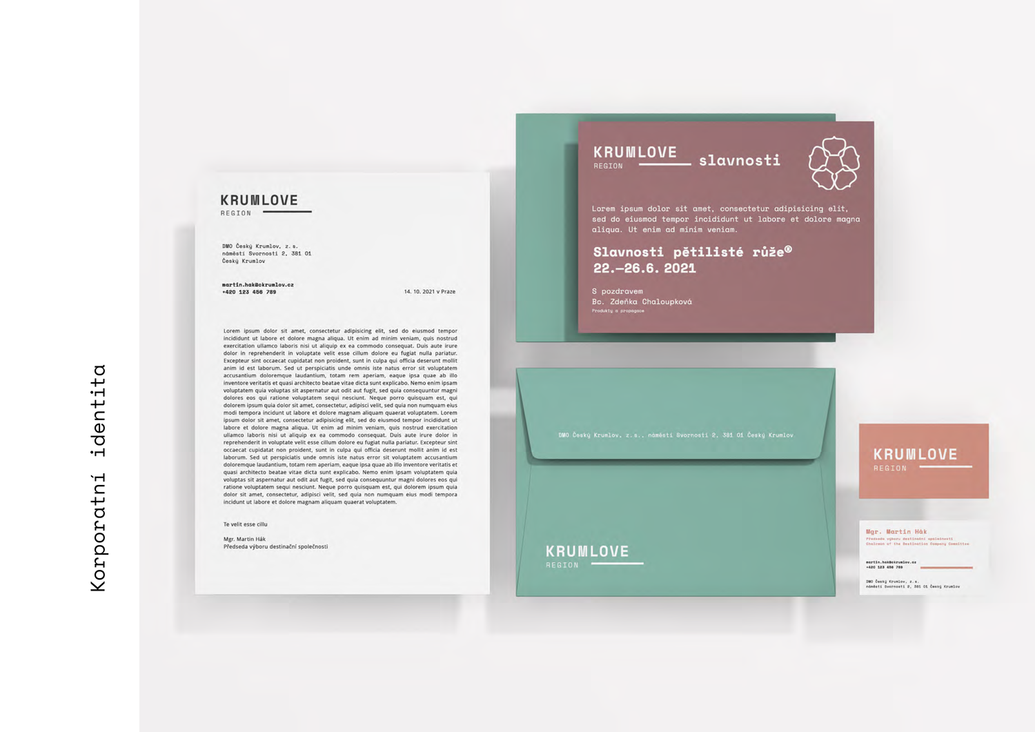 Collection of printed materials including a letter, two envelopes, and two cards. The letter is on the left side with black text, while the envelopes are on the right side with a teal color and white text. The two cards are on top of the envelopes wi