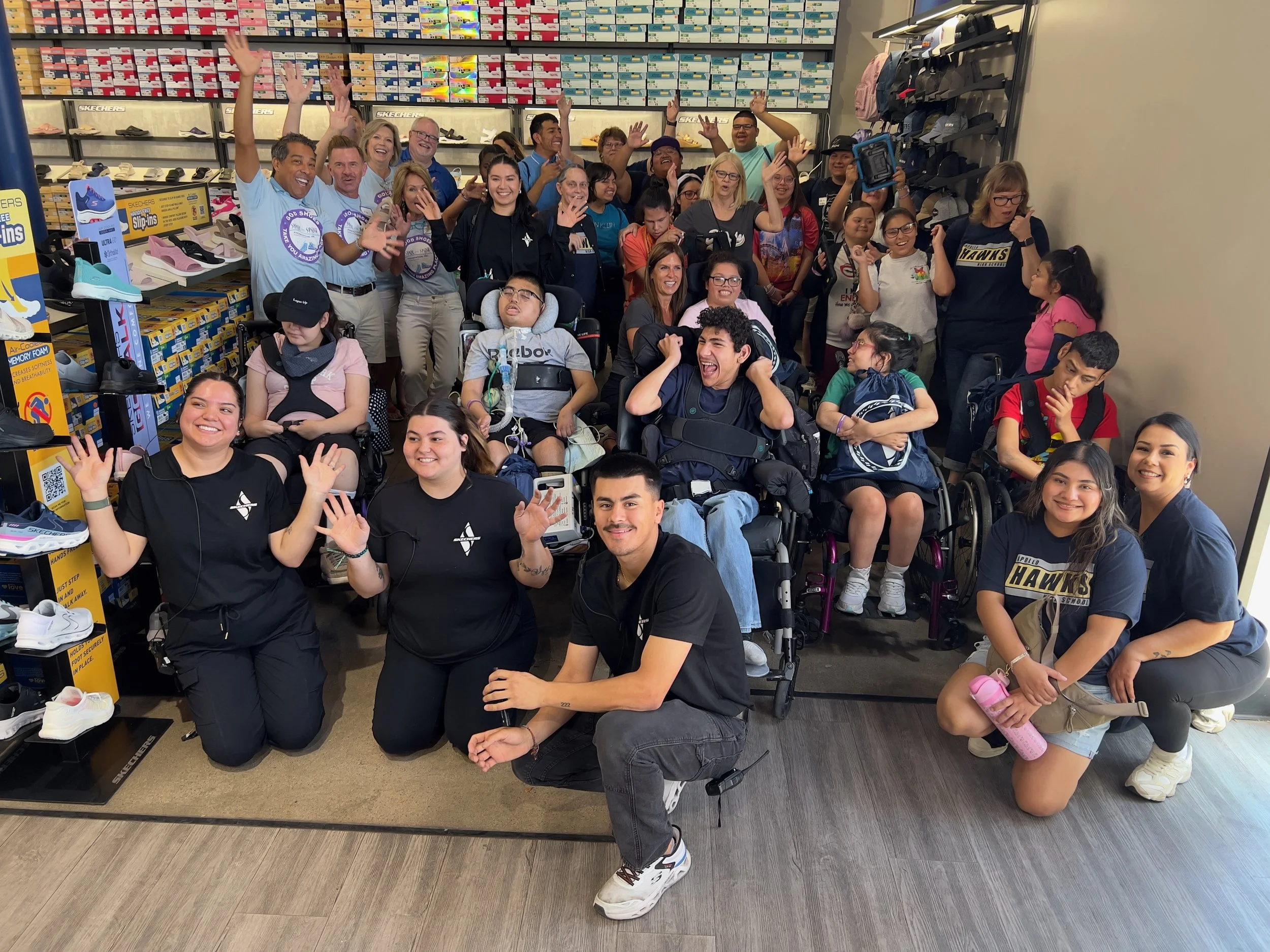 Volunteers and students at the April 2025 Share The Spirit Foundation event. 