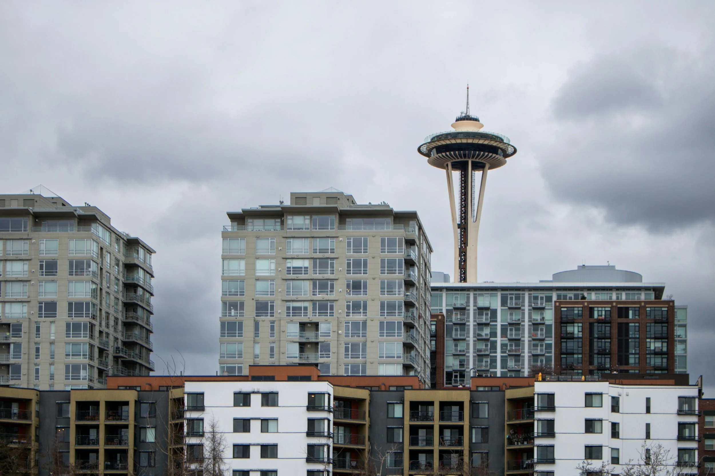 Apartment buildings in Seattle with the Space Needle in the background