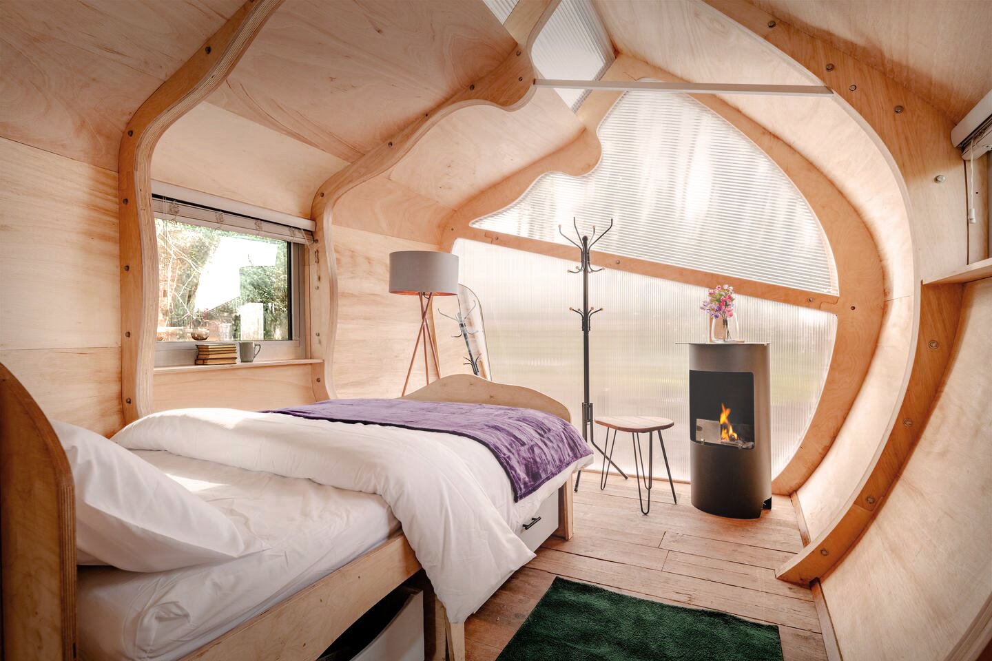 Architect-designed eco cabin for a luxury holiday let, set in woodland, designed by Markos Design Workshop