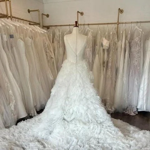 Are you or someone you know in the market for a wedding gown? Not only does Ravinia Bridal have a large selection of beautiful dresses, but right now you can take advantage of 30% off of all gowns and 50% off of select inventory. Say "I do"