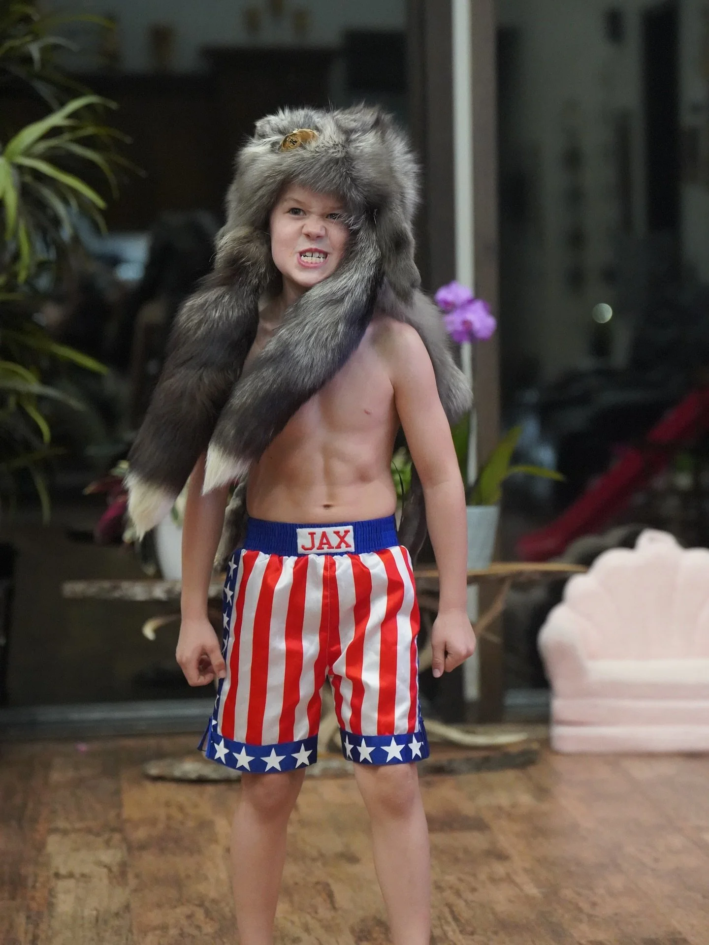 Jax absolutely loved the silver fox fur hat I picked up this weekend at the @sciwisconsin banquet. He&rsquo;s convinced it would be the ultimate intimidation move to wear while walking out for a wrestling match. 😆
Not happening&hellip; but a kid can