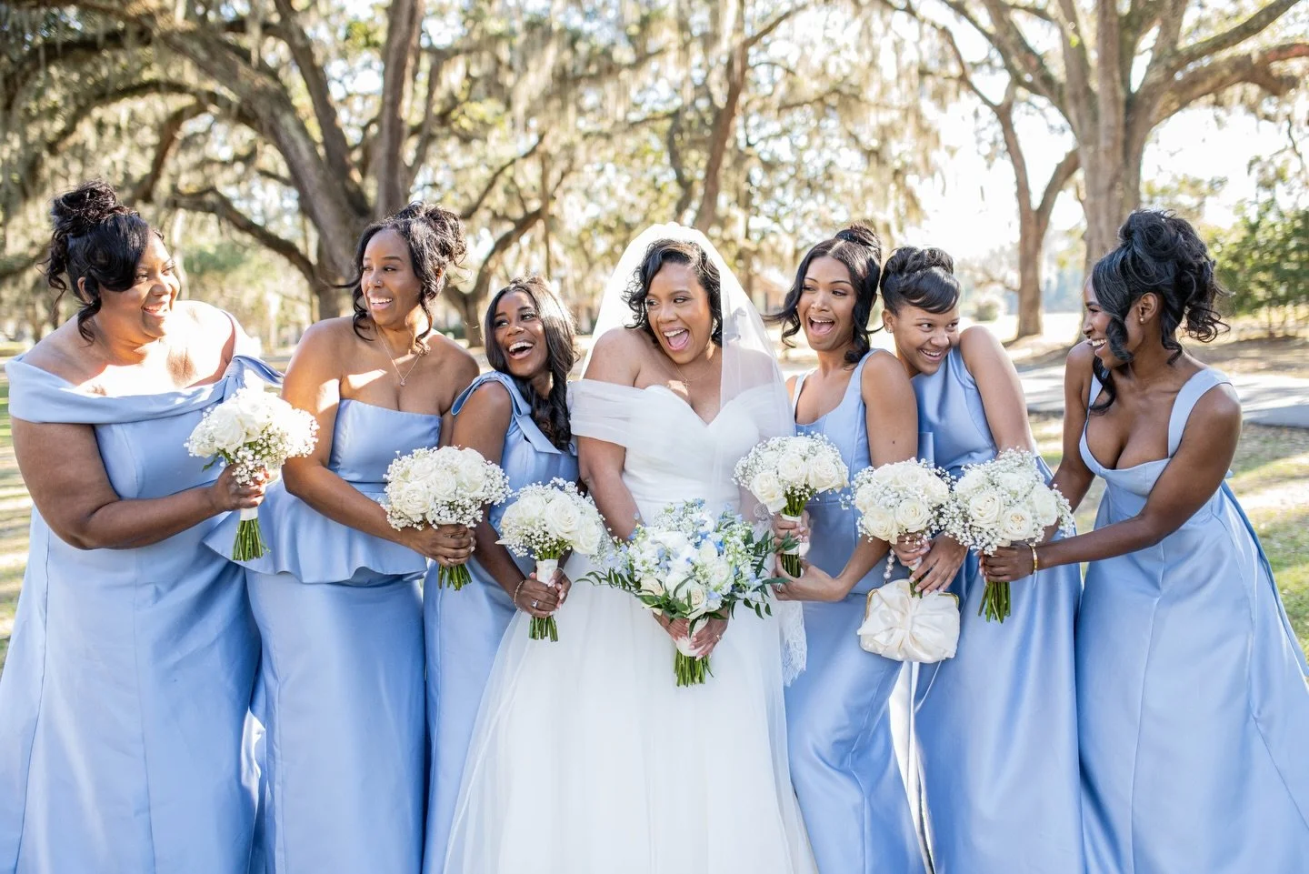 Winter weddings in Savannah just hit different 🤍 Light blue dresses, chilly air, and bridesmaids who bring all the joy.