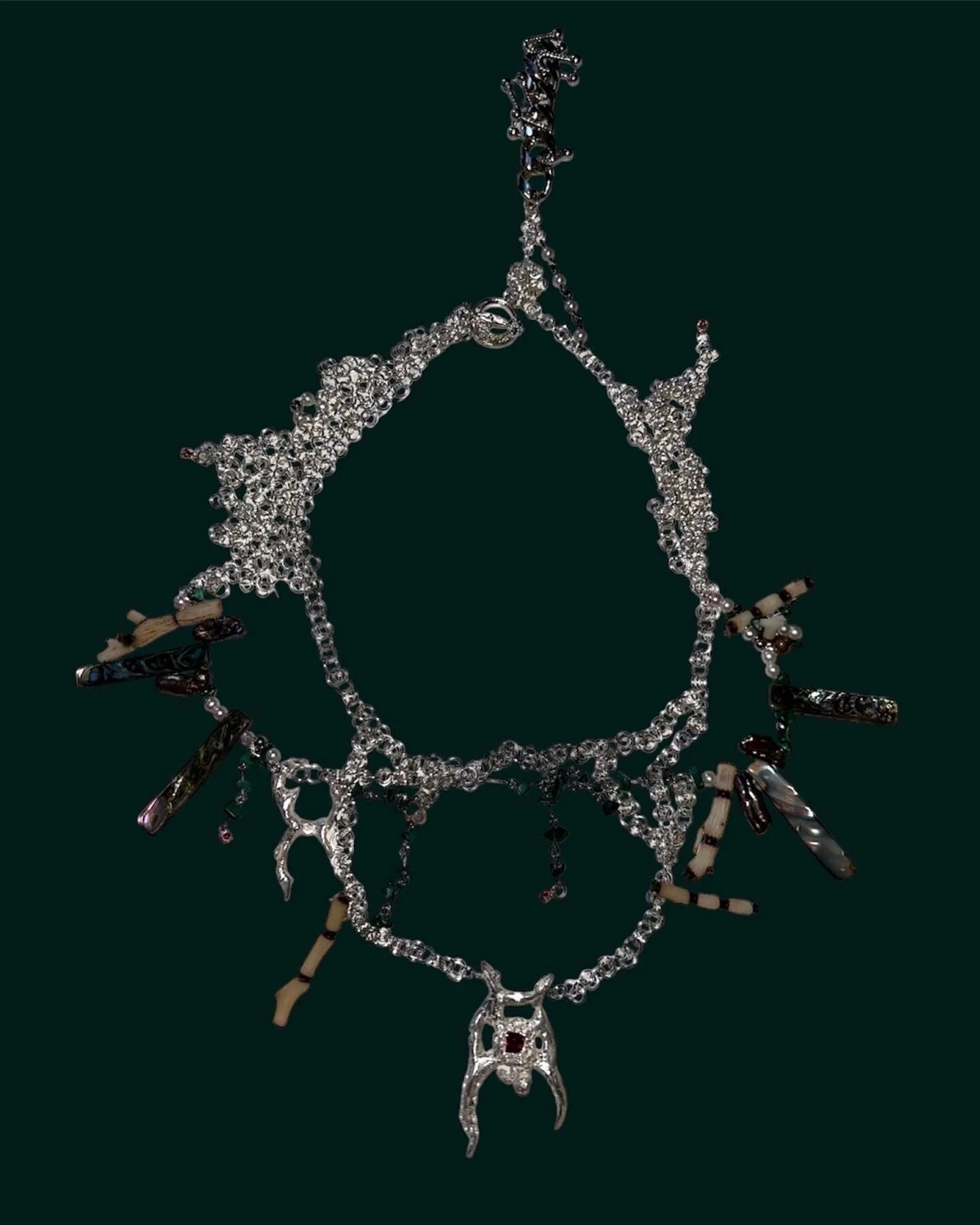 siren (SS23)
Sterling silver, tiger coral, abalone, malachite, freshwater pearl, cubic zirconia