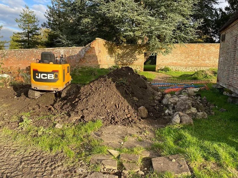 Lots happening the last two weeks! Work has started to repair the fallen wall (fell in Feb 2022), the old diesel tank has been removed and the lean-to transformed into a beautiful tool room. 
Also, more windows and doors, including the transformatio