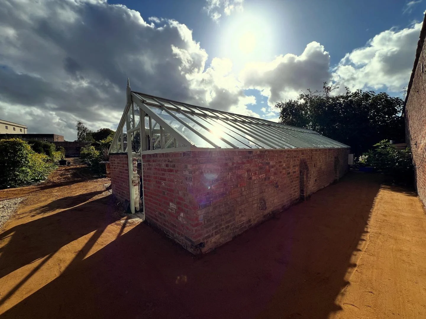 All glass and electric in the greenhouse, plus paths around all finished