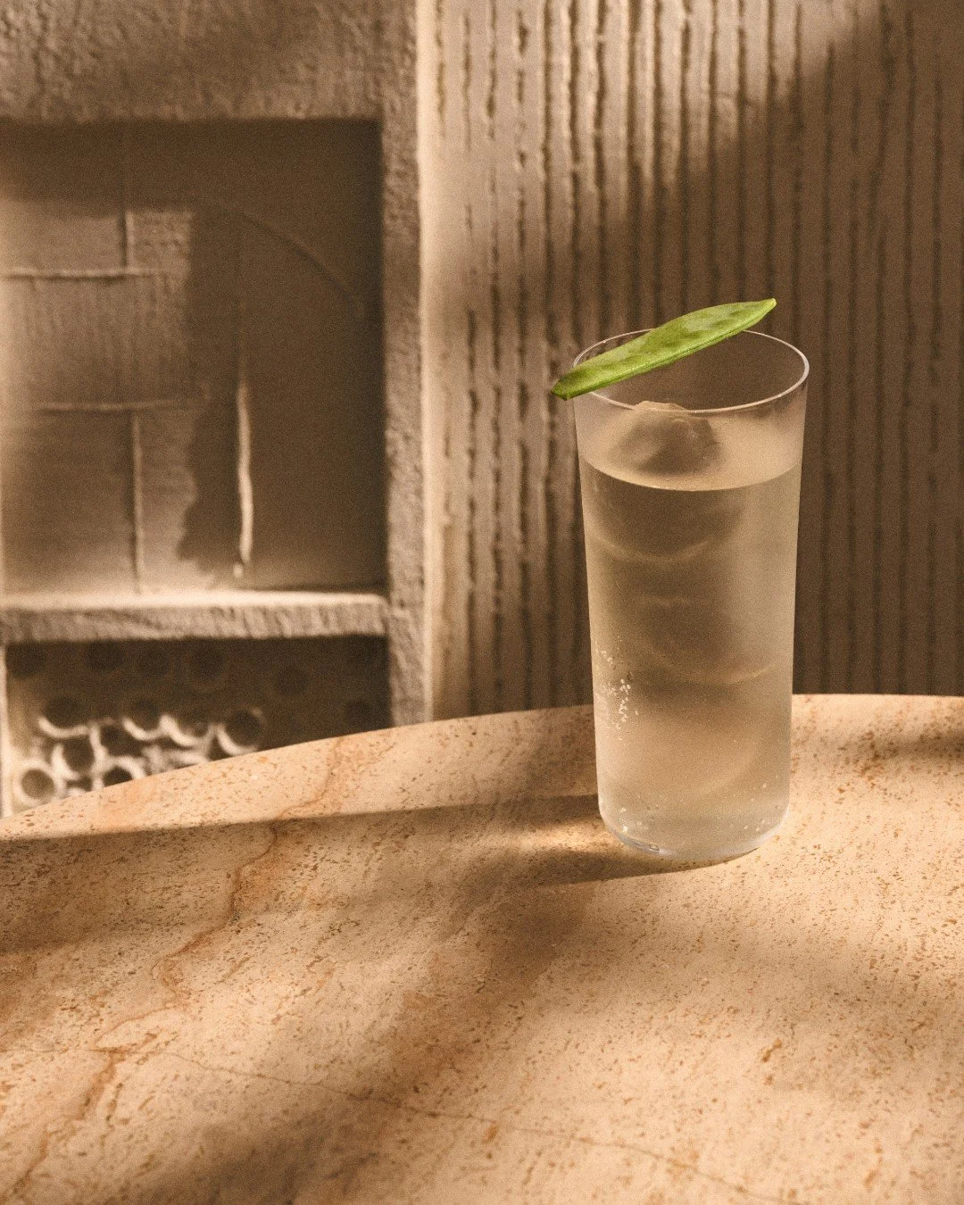 Meet Eros' Whim, a luminous elixir that moves effortlessly between smoke and light. Mezcal&rsquo;s depth is lifted by fresh snow peas, warmed with green cardamom, and finished with a delicate touch of sesame oil, evoking sun-soaked shores and late ni