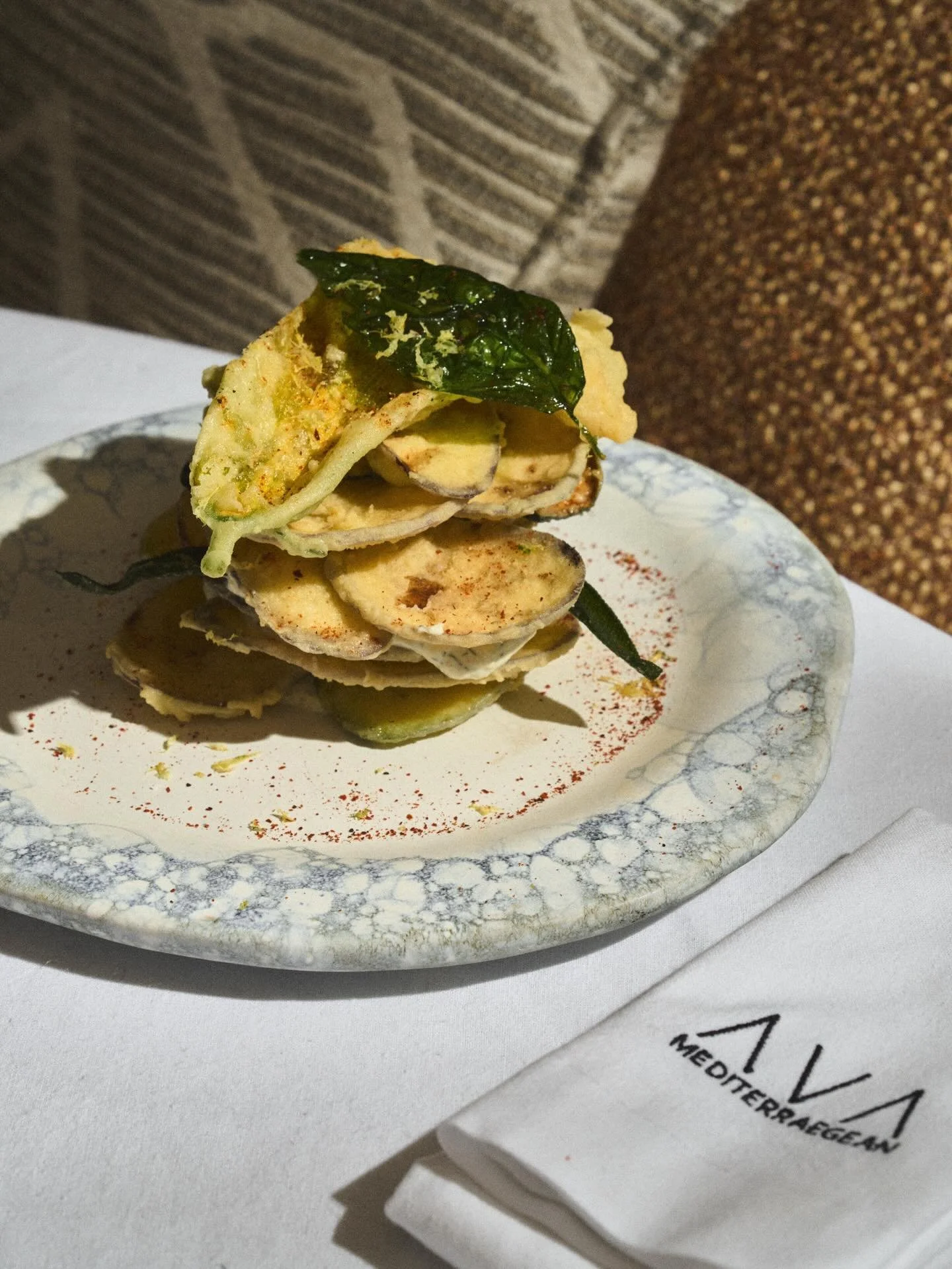 Embark on a culinary journey at AVA Coconut Grove, where every dish is curated to transport you to the Mediterranean. Begin with our Crispy Zucchini, continue with the Athenian Lobster Linguine, and end on a sweet note with our decadent Chocolate Mou