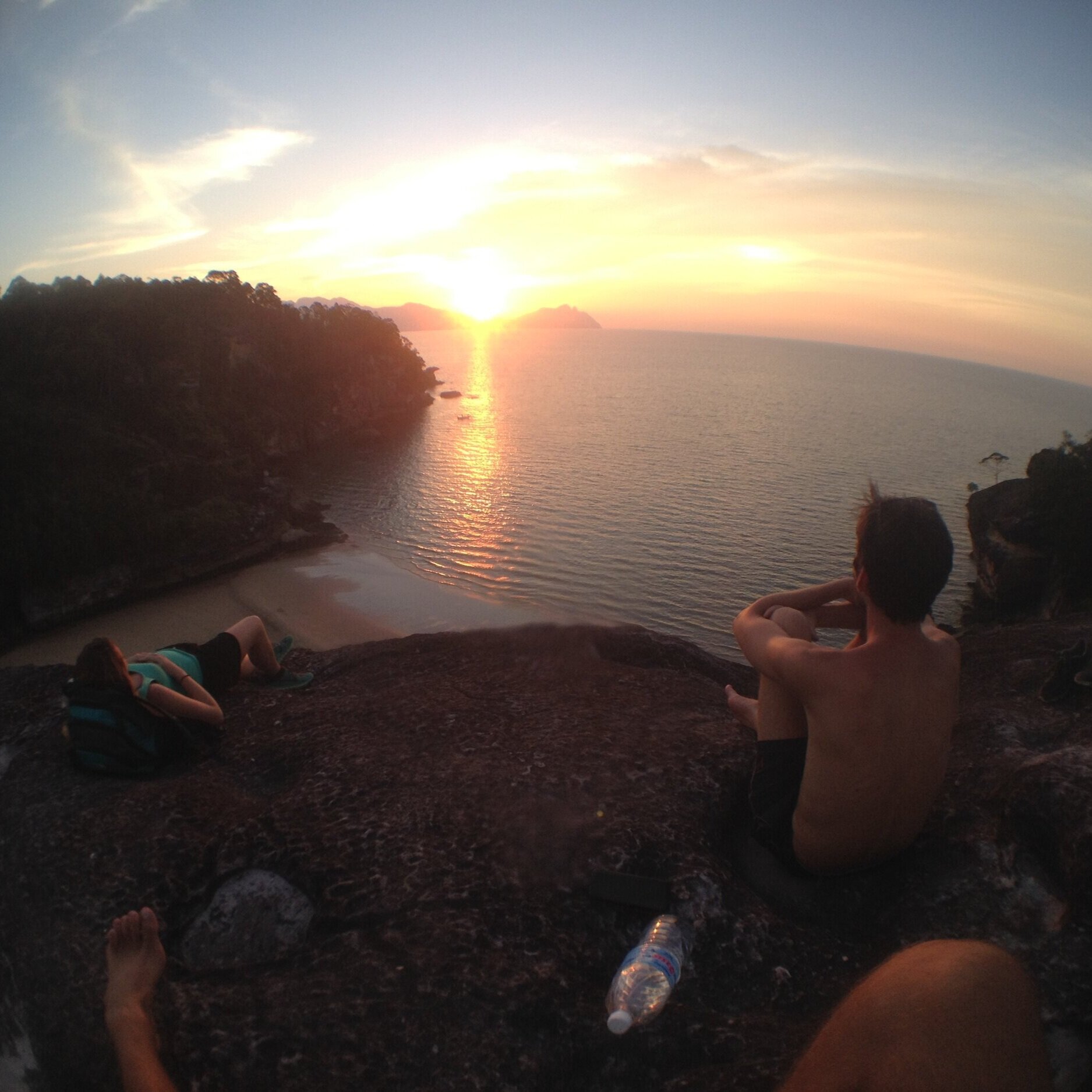 BAKO PARK, MALAYSIAN BORNEO - Long day hiking through Bornean jungles ended with a spectacular sunset. Saltwater crocs hung out on the beach below this cliff