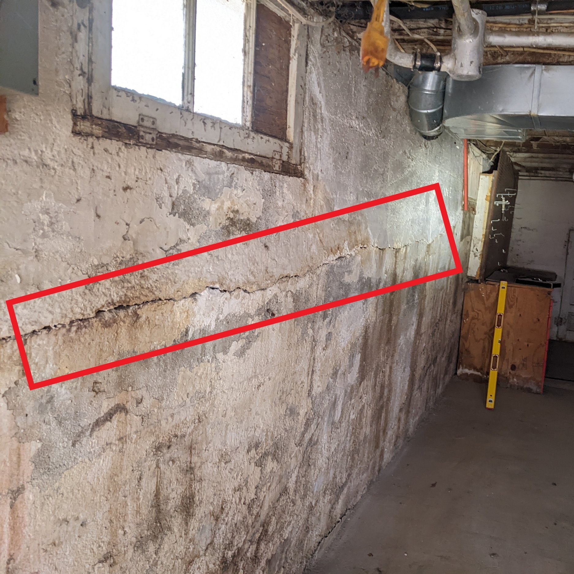Horizontal crack in concrete foundation wall.