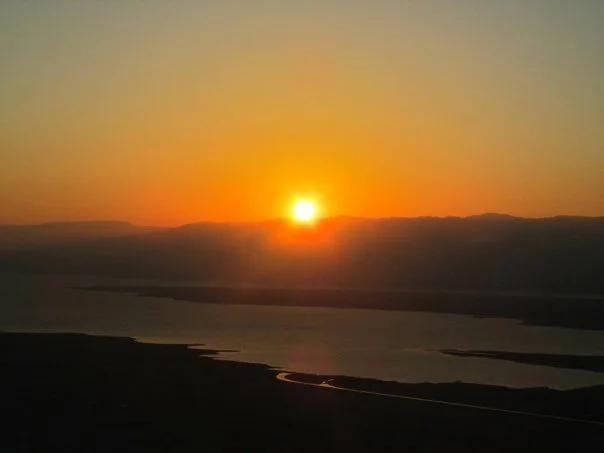 Ch 15: FOMO - Photo of the sunrise witnessed sitting atop Masada.