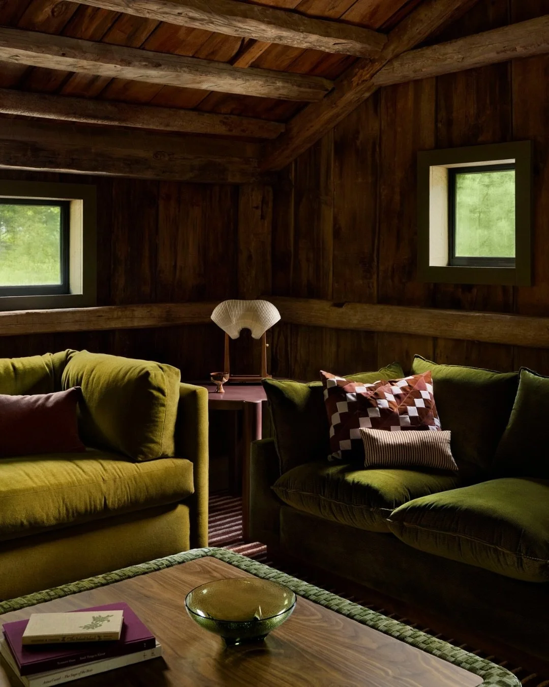 A tour of our Brume Hollow project&rsquo;s living room.

Tucked into the woods of New Hampshire, this former 1800s horse barn was reimagined as a summer home for family to gather. We loved embracing all of the character that came with the original bu