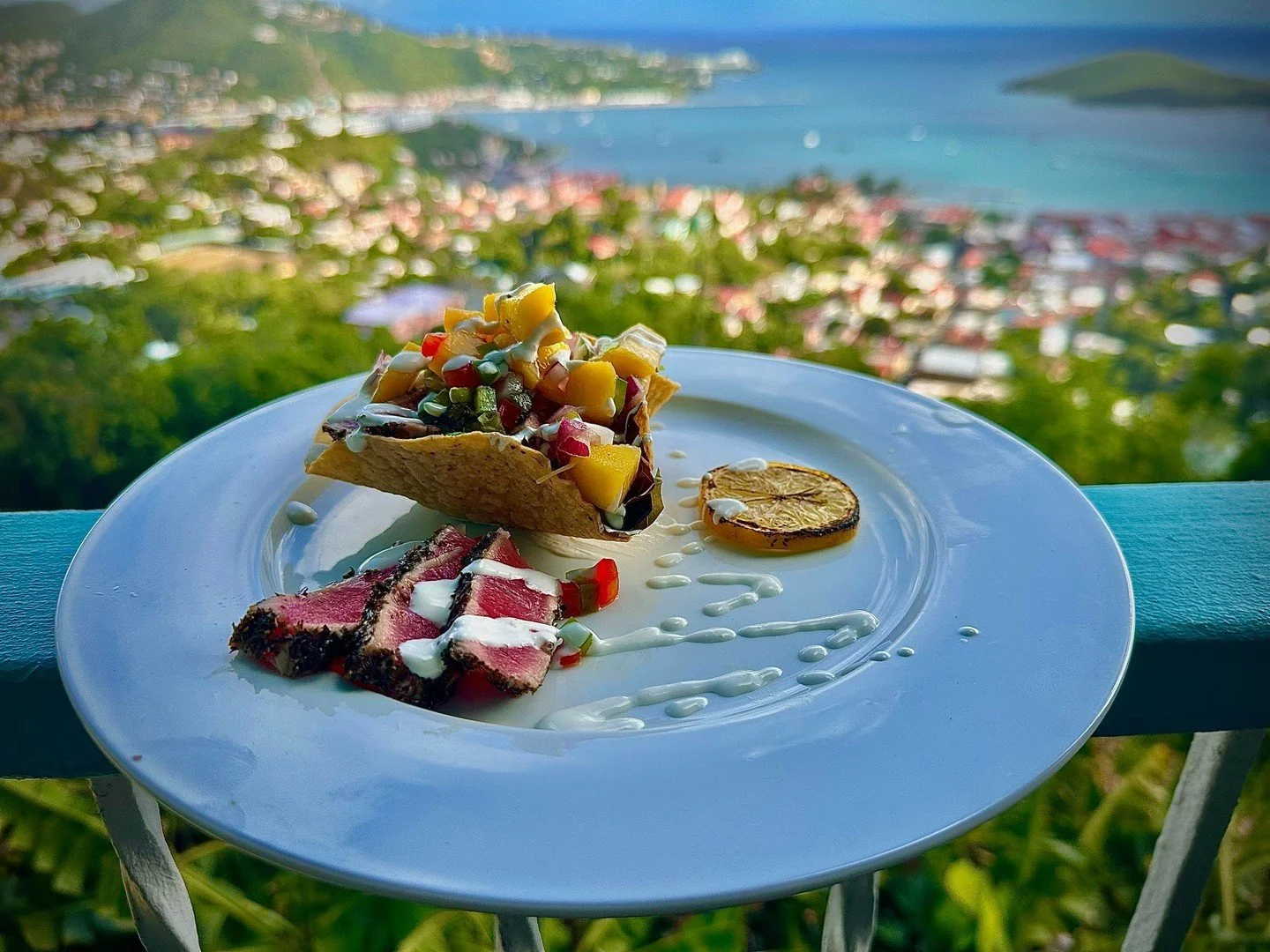 Chef Robert's having fun in the kitchen. The Ahi Tuna Tostada with Lime Crema looks good but is a little shy. Come bring it out of its shell!
