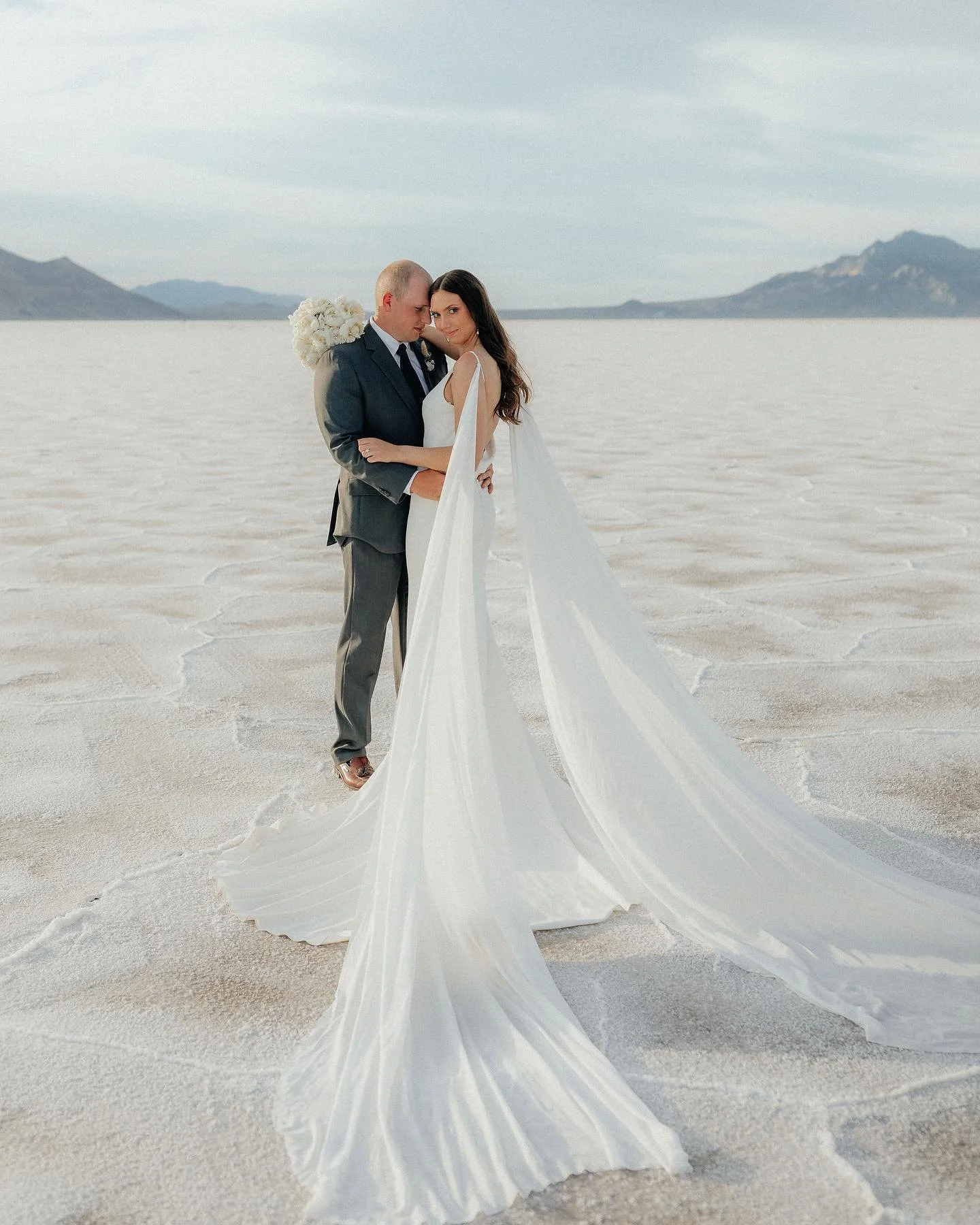 Magical moments and a beautiful couple captured by @ashlynstott_photography . Elopement brides are near and dear to our hearts, you can't get much better of a backdrop than Utah landscapes and a classic peony bouquet to match. 
.
.
.
.
.
#utahflorist