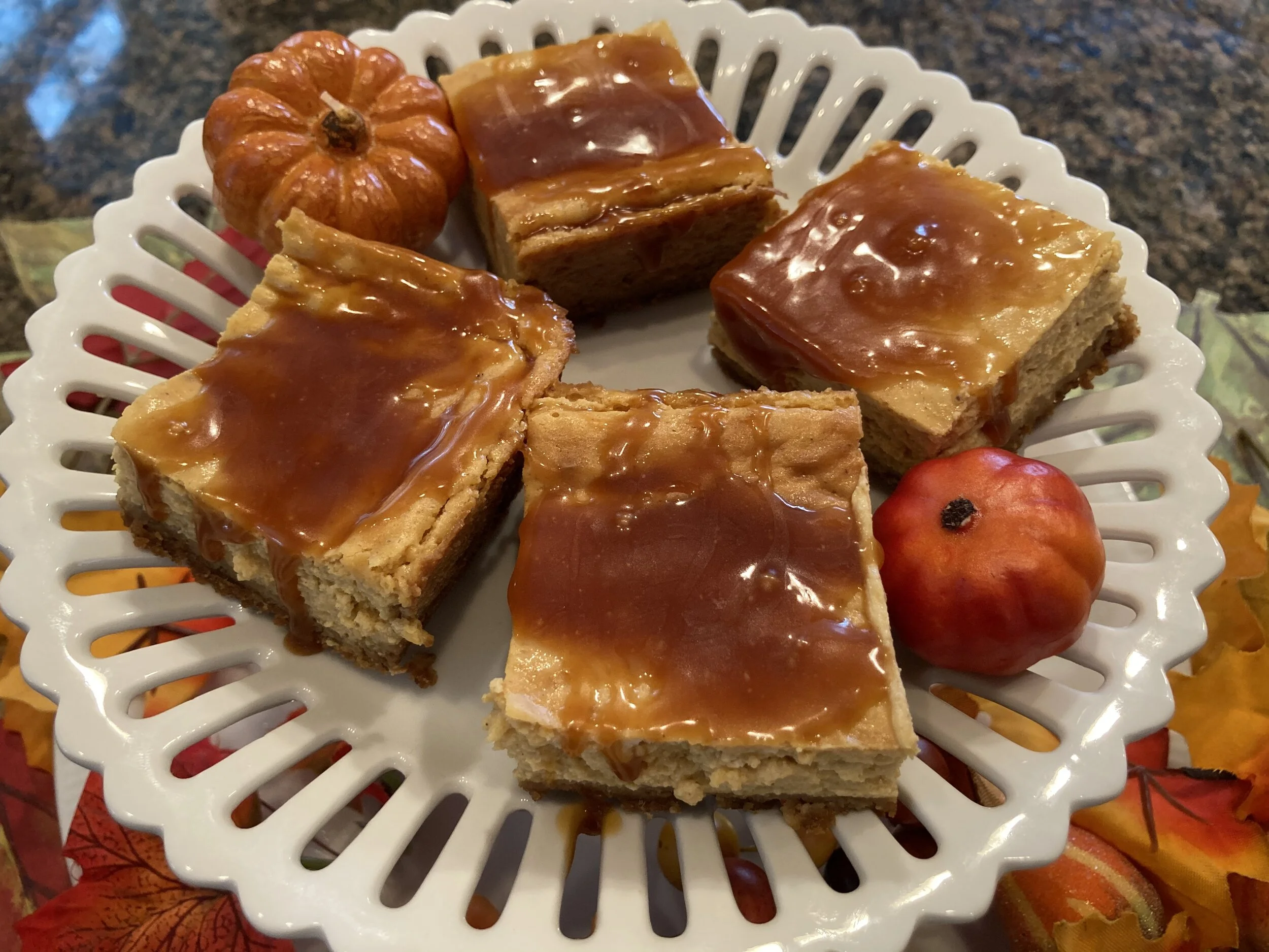 Pumpkin Cheesecake Bars with Gingersnap Crust, Salted Caramel Drizzle