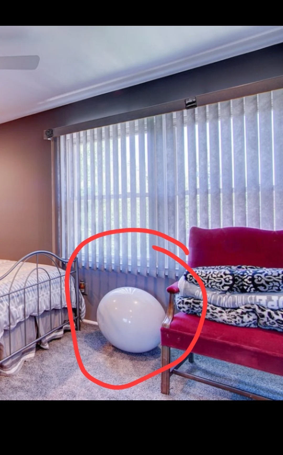 Bedroom with a giant exercise ball