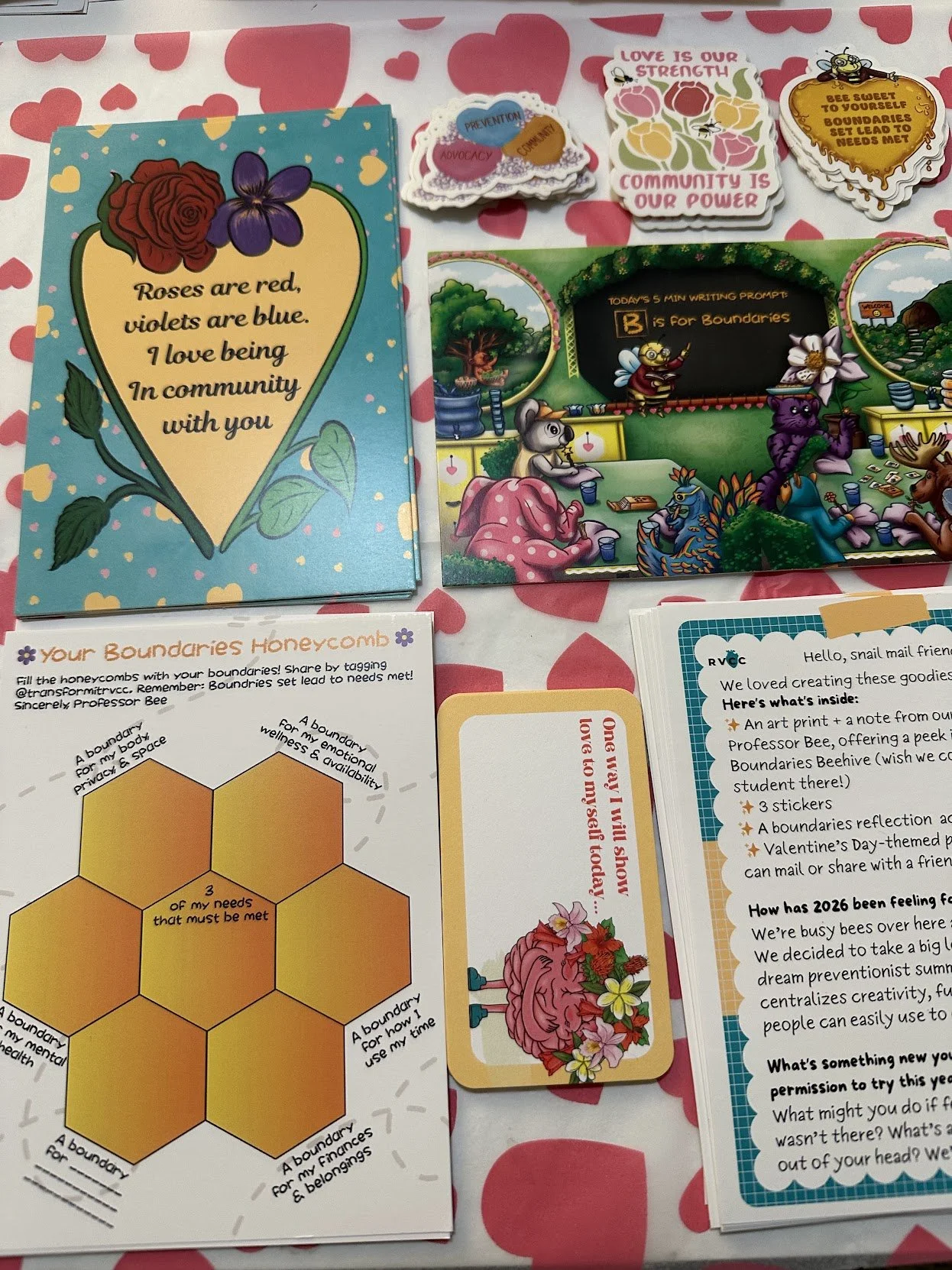 A collection of colorful community-themed educational and motivational materials, including a worksheet on boundaries, and various illustrated flyers and cards with messages about community, love, and growth.