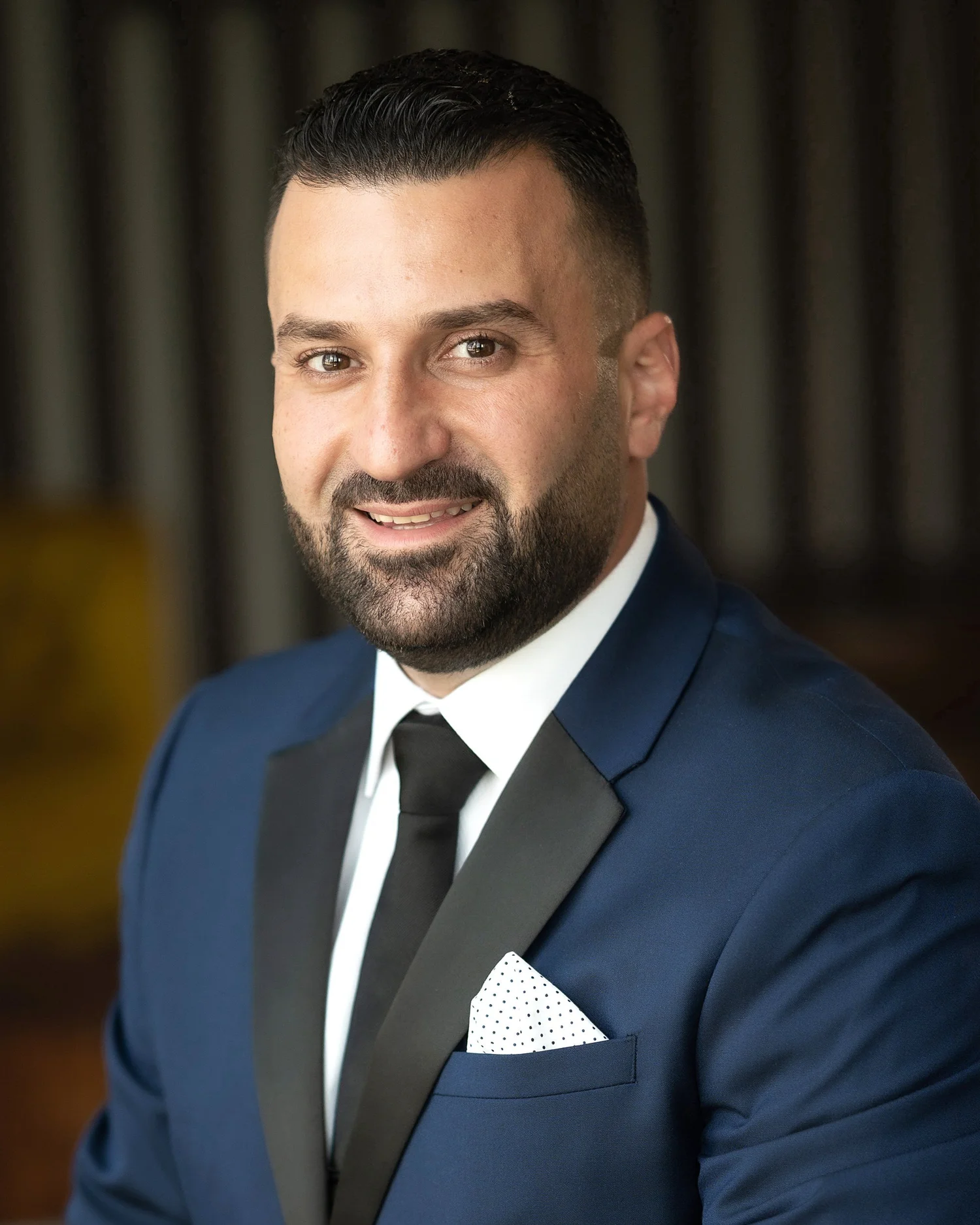 Portrait of Zak, wedding photographer and filmmaker at Zak Studio in Troy, Michigan