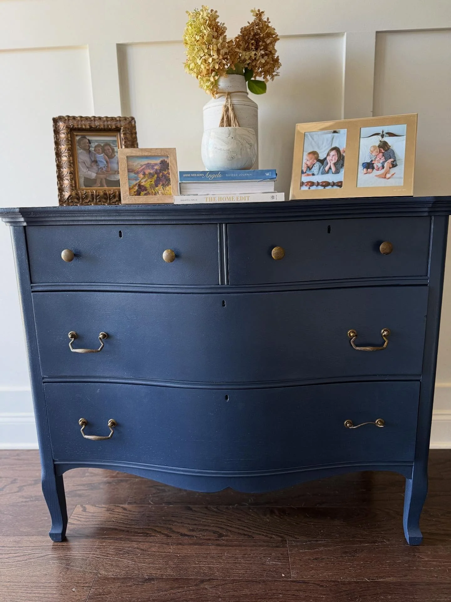 [A V A I L A B L E ]
///Versatile Navy Blue Vintage Dresser with Detachable Mirror///

This vintage dresser has been refinished in a rich navy blue paint with a wax protective finish. The piece features graceful curved drawer fronts, elegant brass ha
