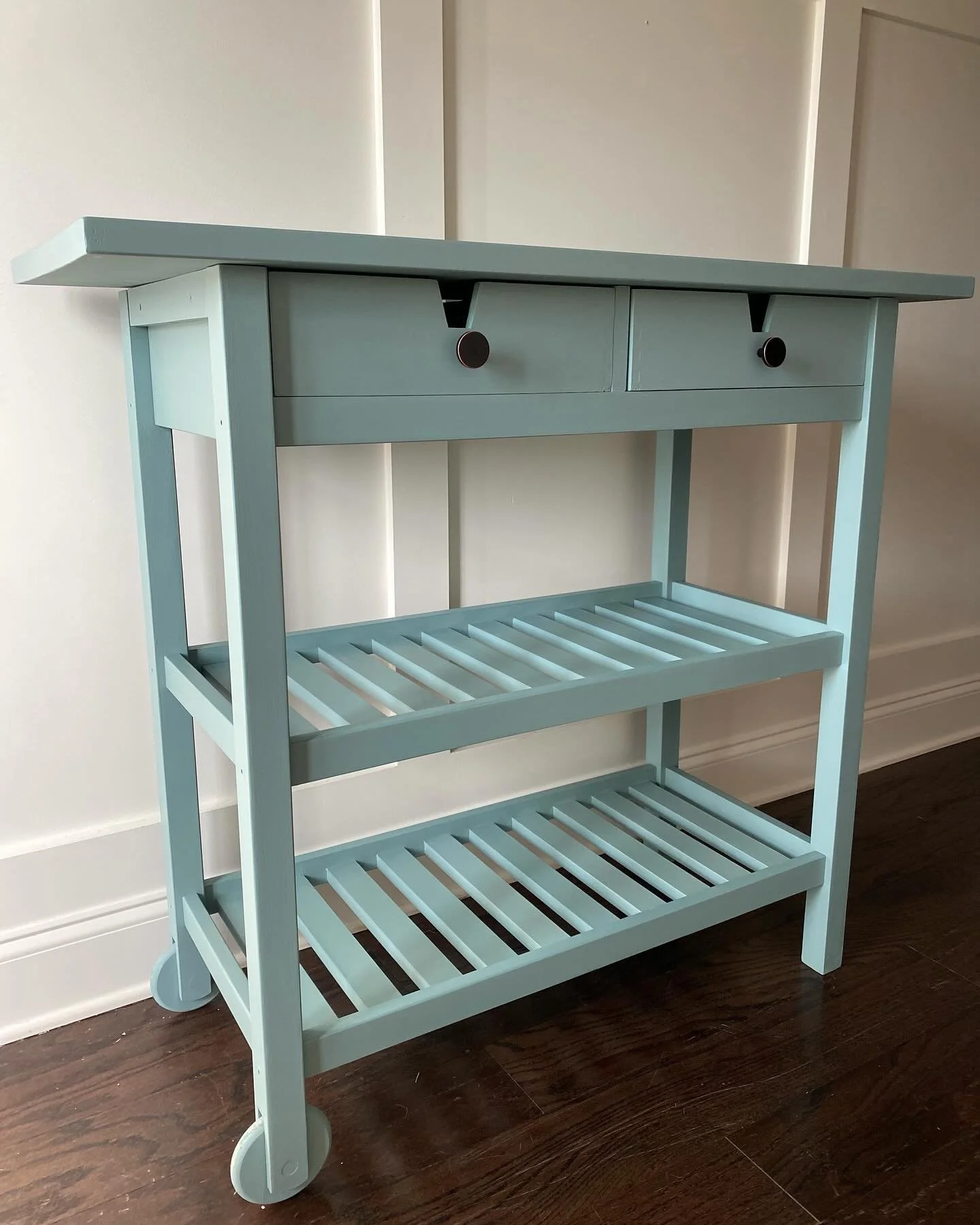 Commissioned table refinished in Dixie Belle Satin paint and topcoat. A great facelift for a functional piece.
