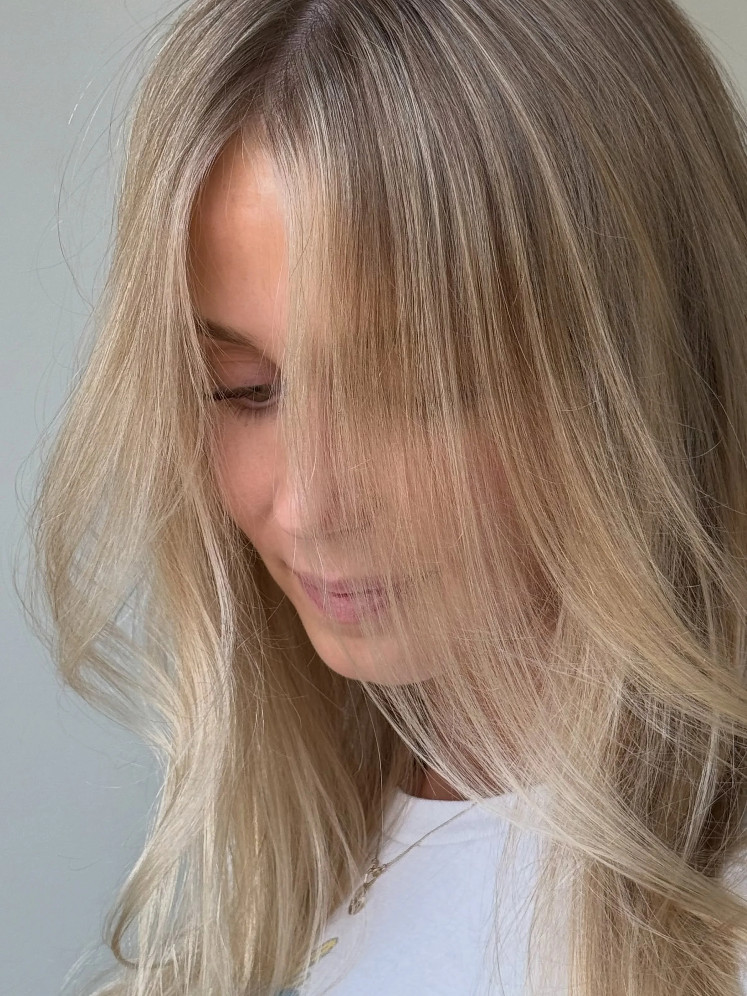 Super fine babylights create the best blends. I placed these in a Mohawk section to create soft ribbons of blonde that won&rsquo;t get lost in her fine textured hair.