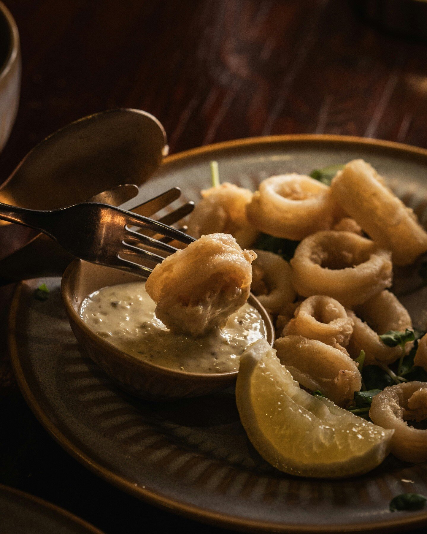 Spritz with lemon, and submerge into the house made lemon and caper mayonnaise ~ our calamari is truly a thing of beauty.