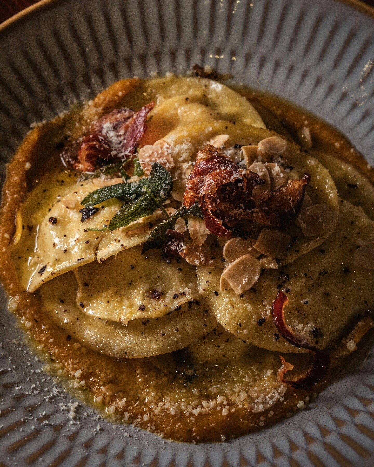 Our Cappellacci is filled with buffalo mozzarella and is tossed in burnt butter, with sage. They sit atop pumpkin puree, and are crowned with crisp pancetta and crunchy almonds. Go on, treat your self.