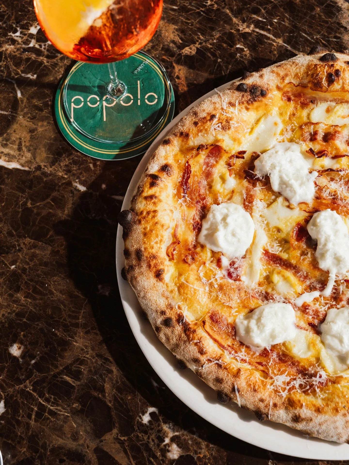 The union you never thought you needed. Chef Francesco has created this incredible situation, where pizza and carbonara meet. Sitting atop his 48 hour fermented dough, we have fior di latte, eggs, black pepper, pecorino sauce, pancetta and stracciate