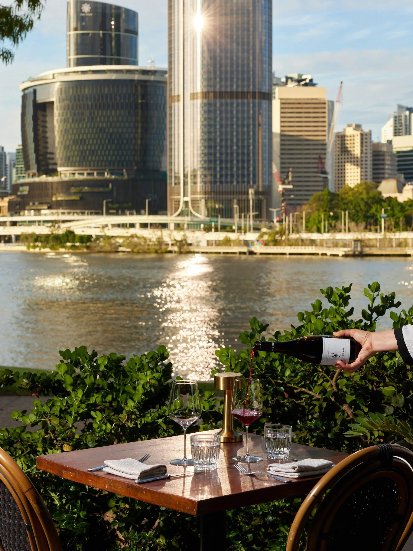 Get a taste of the Italian lifestyle by sipping a glass of wine by the river. Bellissimo