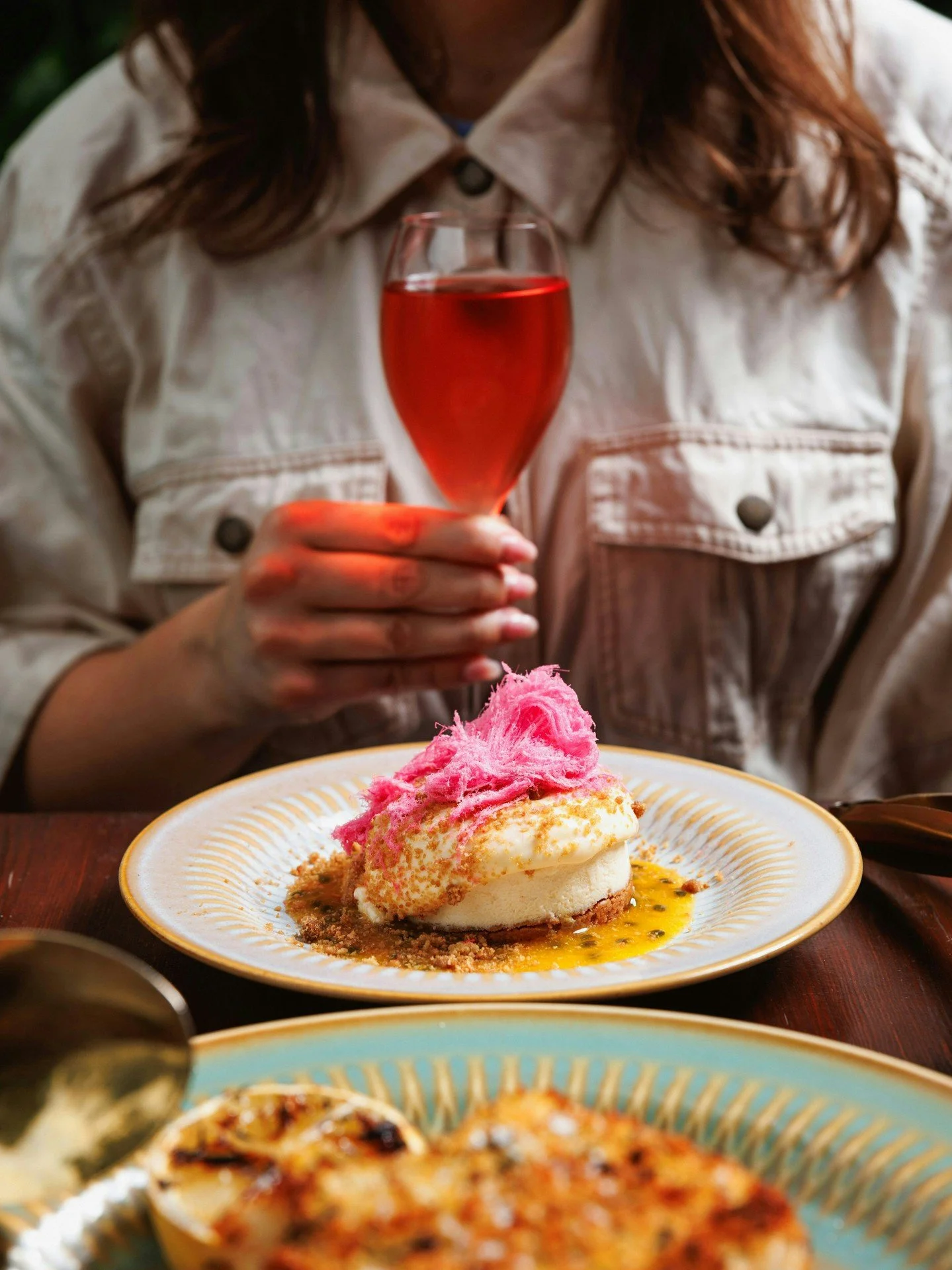 If you think nothing is better than a piece of lemon cheesecake, you've never had it topped with passionfruit coulis and rose fairy floss at Popolo.