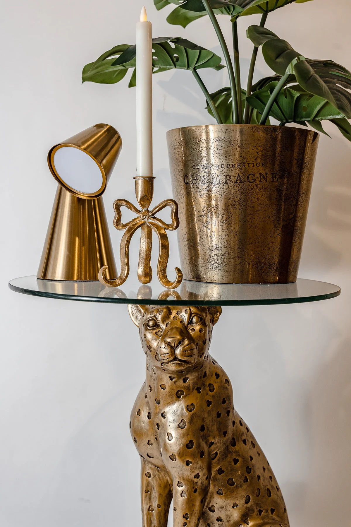 Gold leopard table and homewares