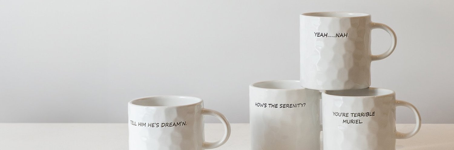 Stacked ceramic mugs