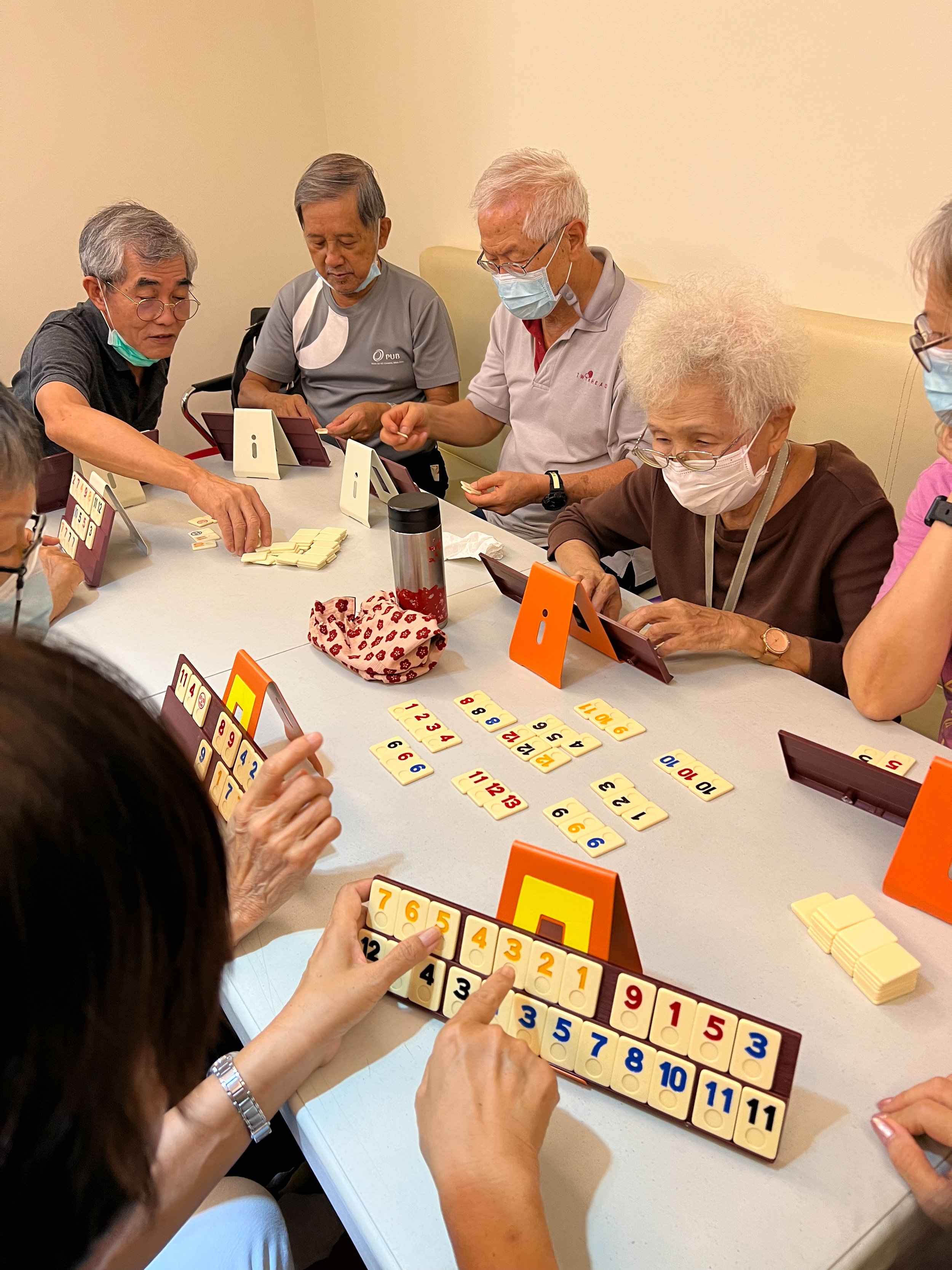 Caleb85 group gathering playing Rummikub 3024x4032.jpg