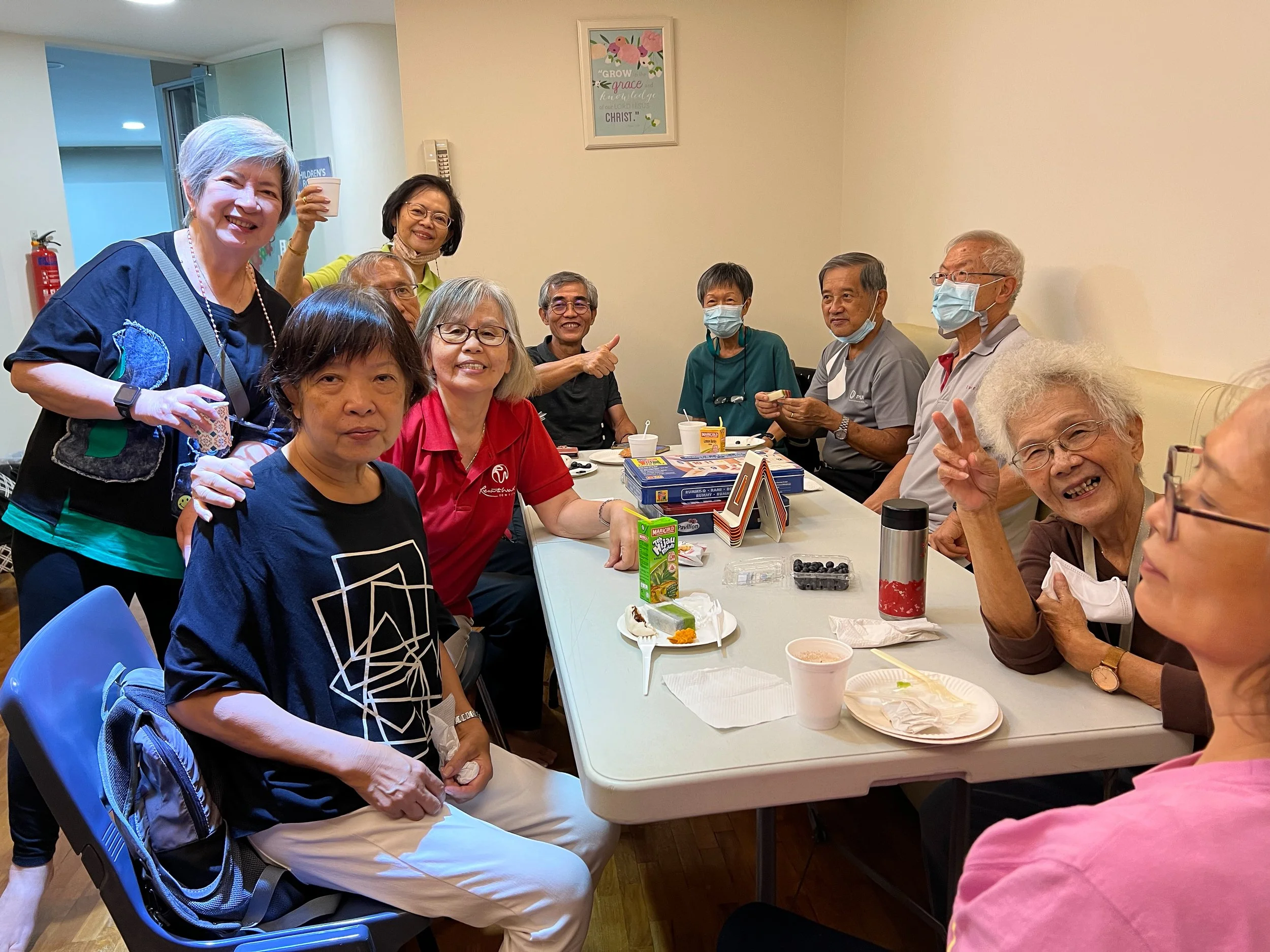 Caleb85 group gathering over a meal with smiles 4032x3024.jpg