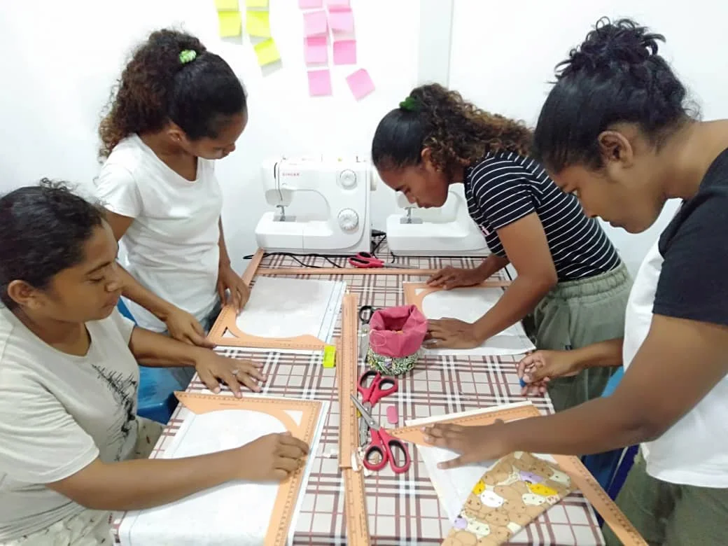 WSCS sewing class with four female students at St Paul Methodist Church in Timor-Leste 1040x780.jpg