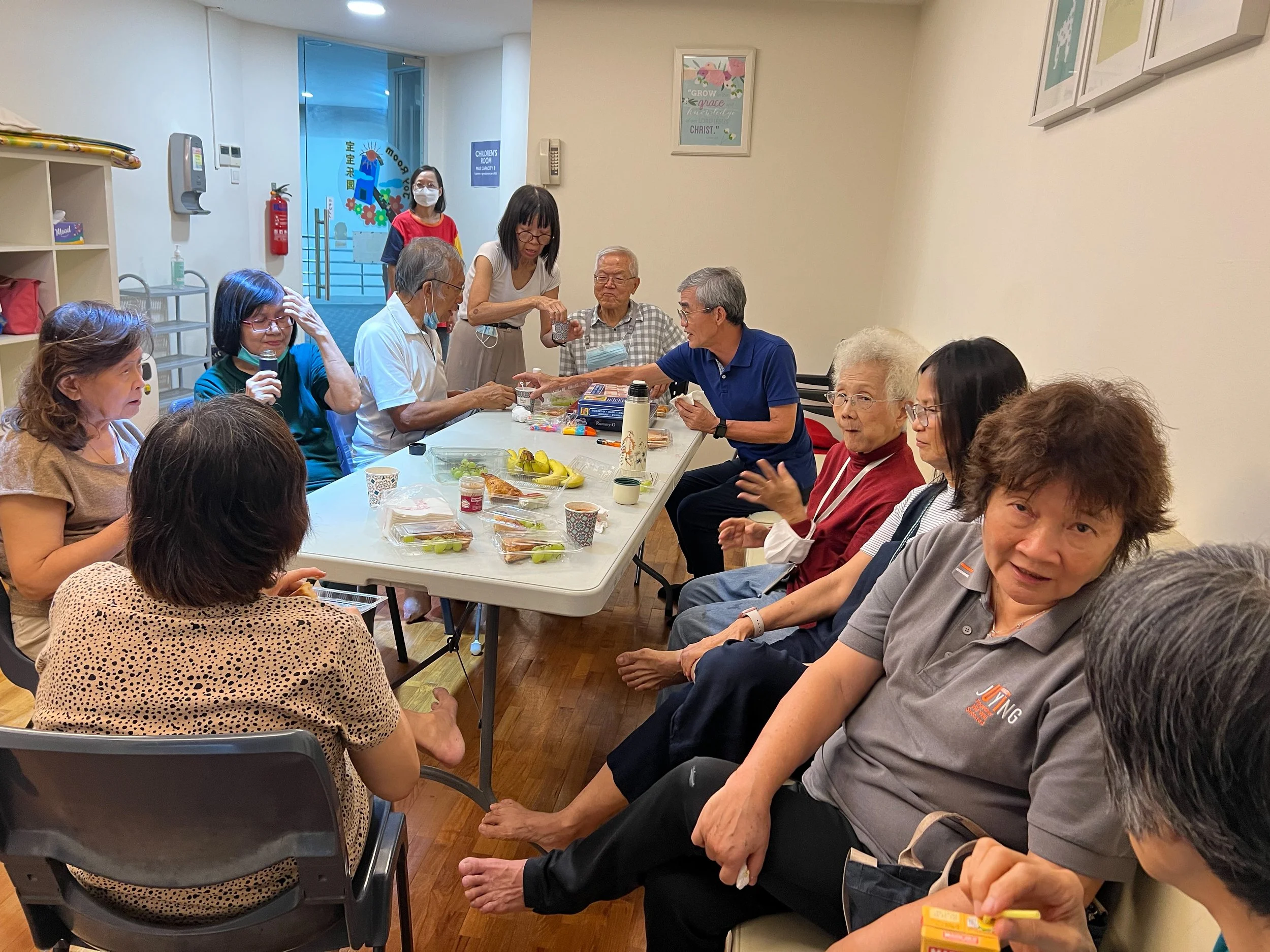 Caleb85 group gathering over a meal centred on table 4032x3024.jpg