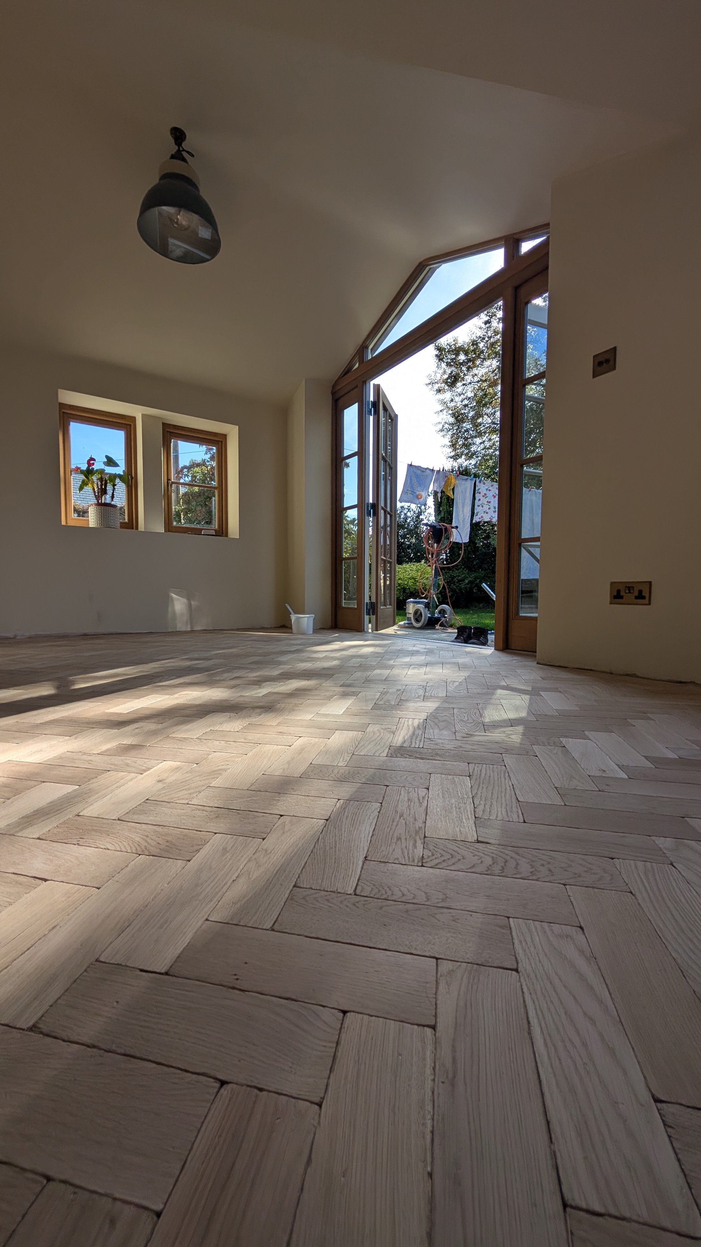 Close up of a parquet floor that has been sanded smooth