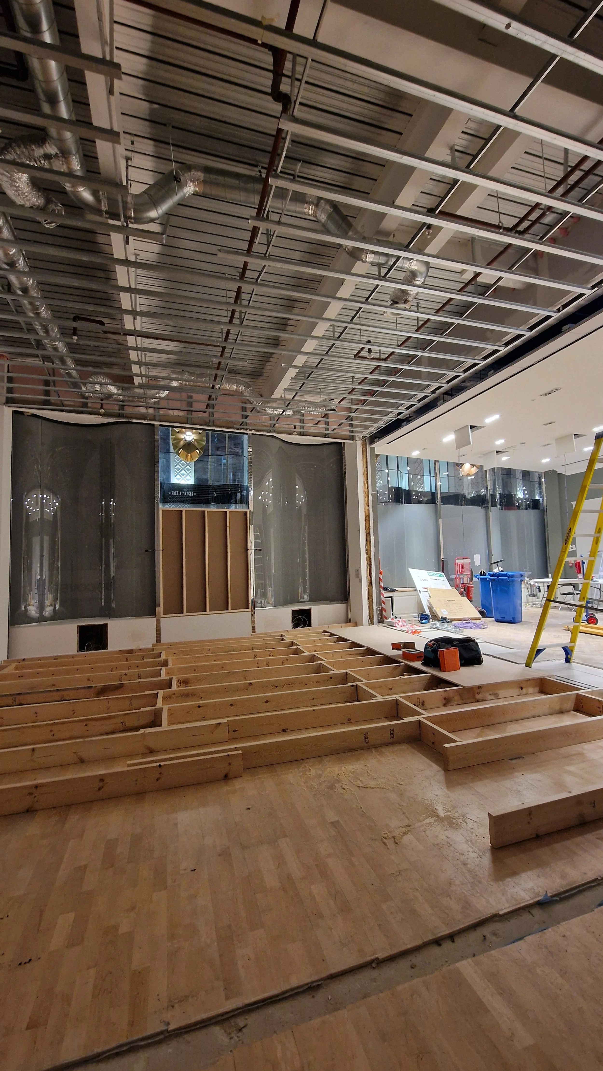 Structural joists being replaced in a shop environment