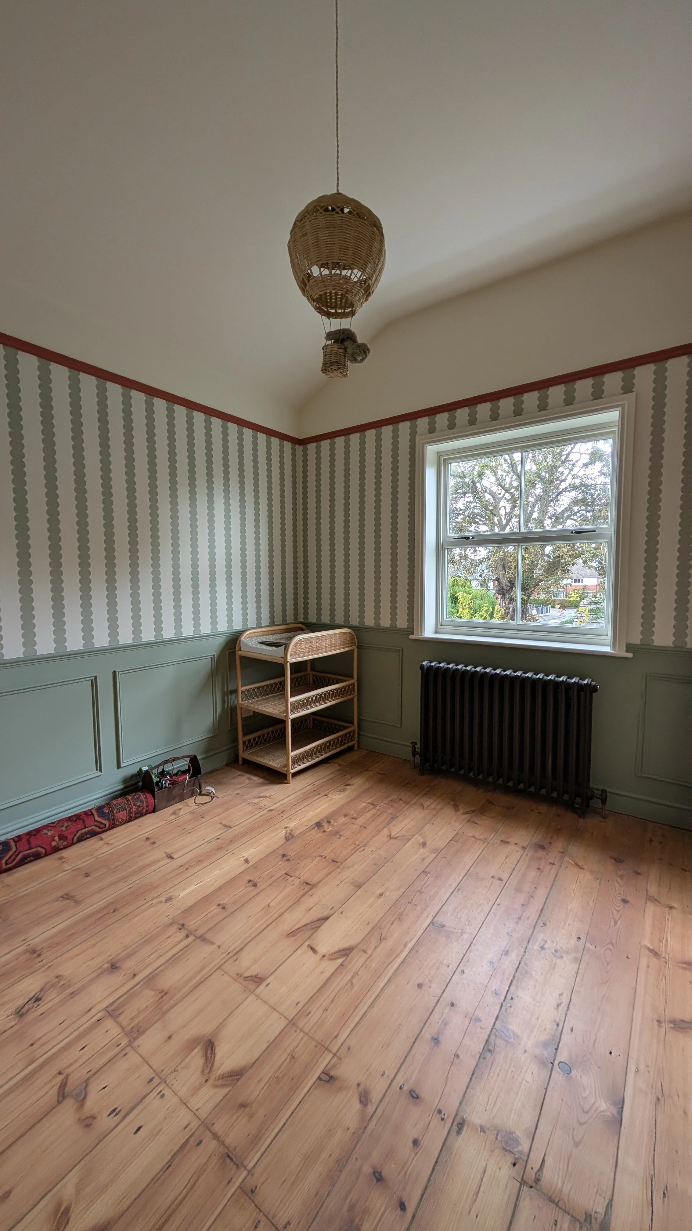 Renovated pine floorboards in a bedroom