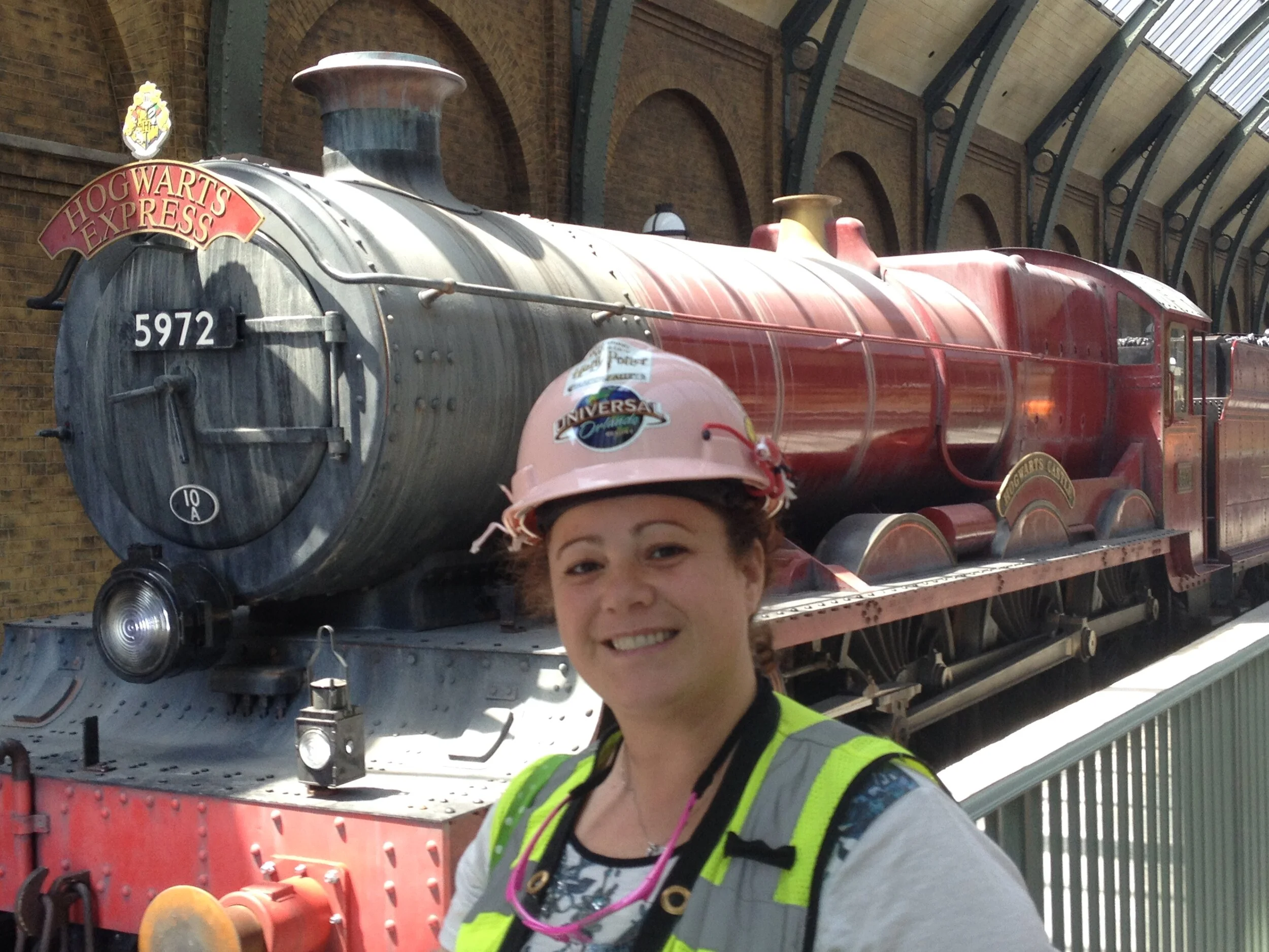 A proud moment in front of the Hogwarts's Express.  I procured color call outs for the train inside & out, graphic files from the films that are used through out the train.  I sourced hand dyed mohair for the seat fabrics in the compartments as well 