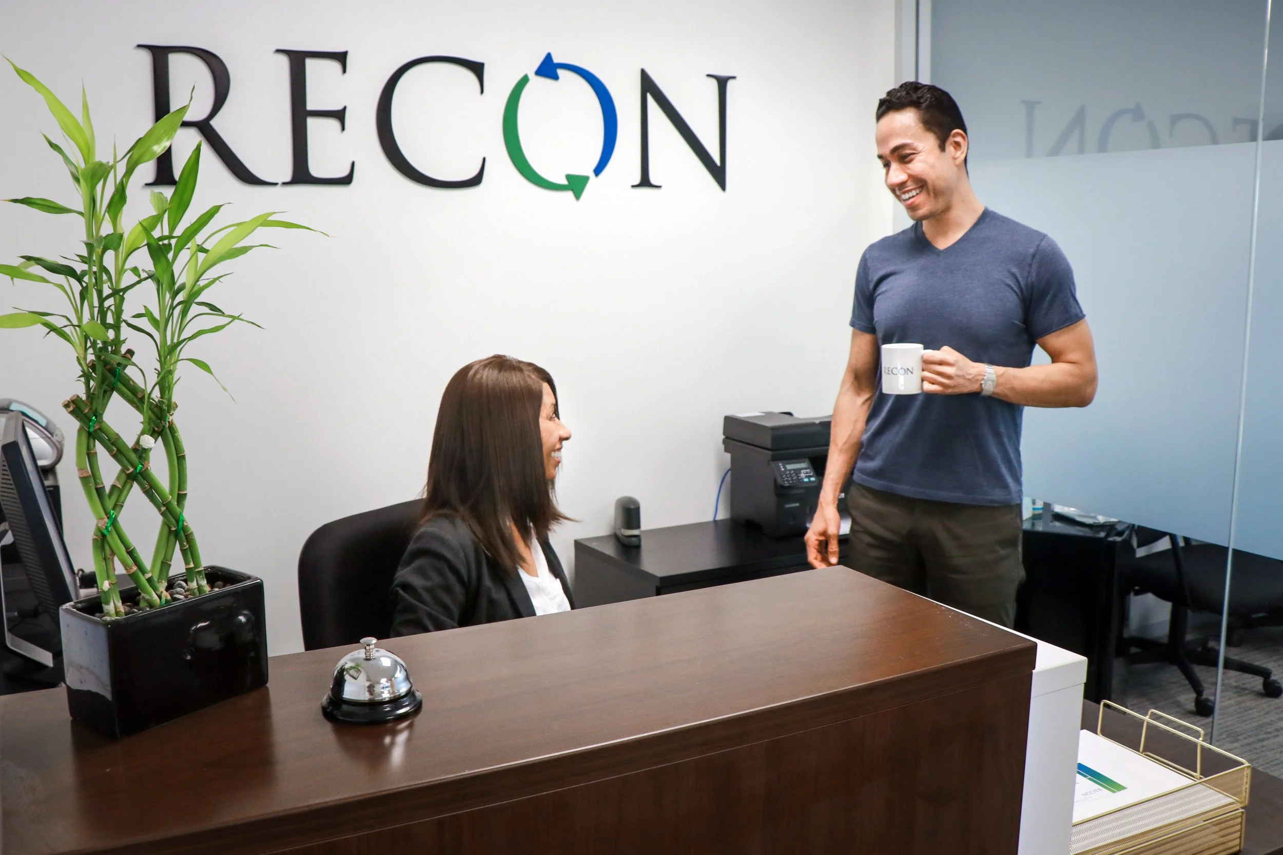 RECON team members Linda (support staff) and Jeff (accounting) in RECON's reception area.