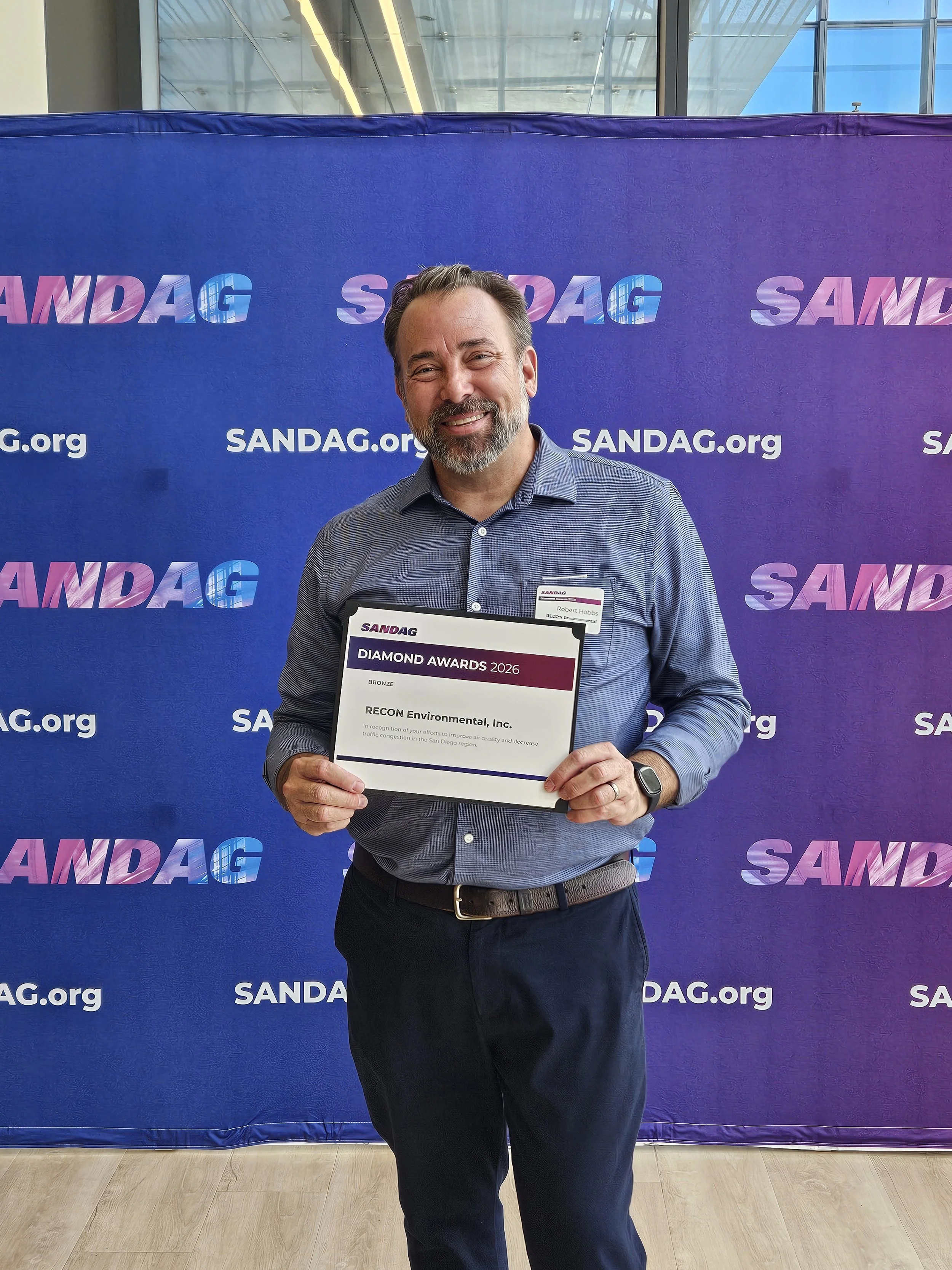 RECON's Meagan Olson and Rob Hobbs with RECON's SANDAG Diamond Award