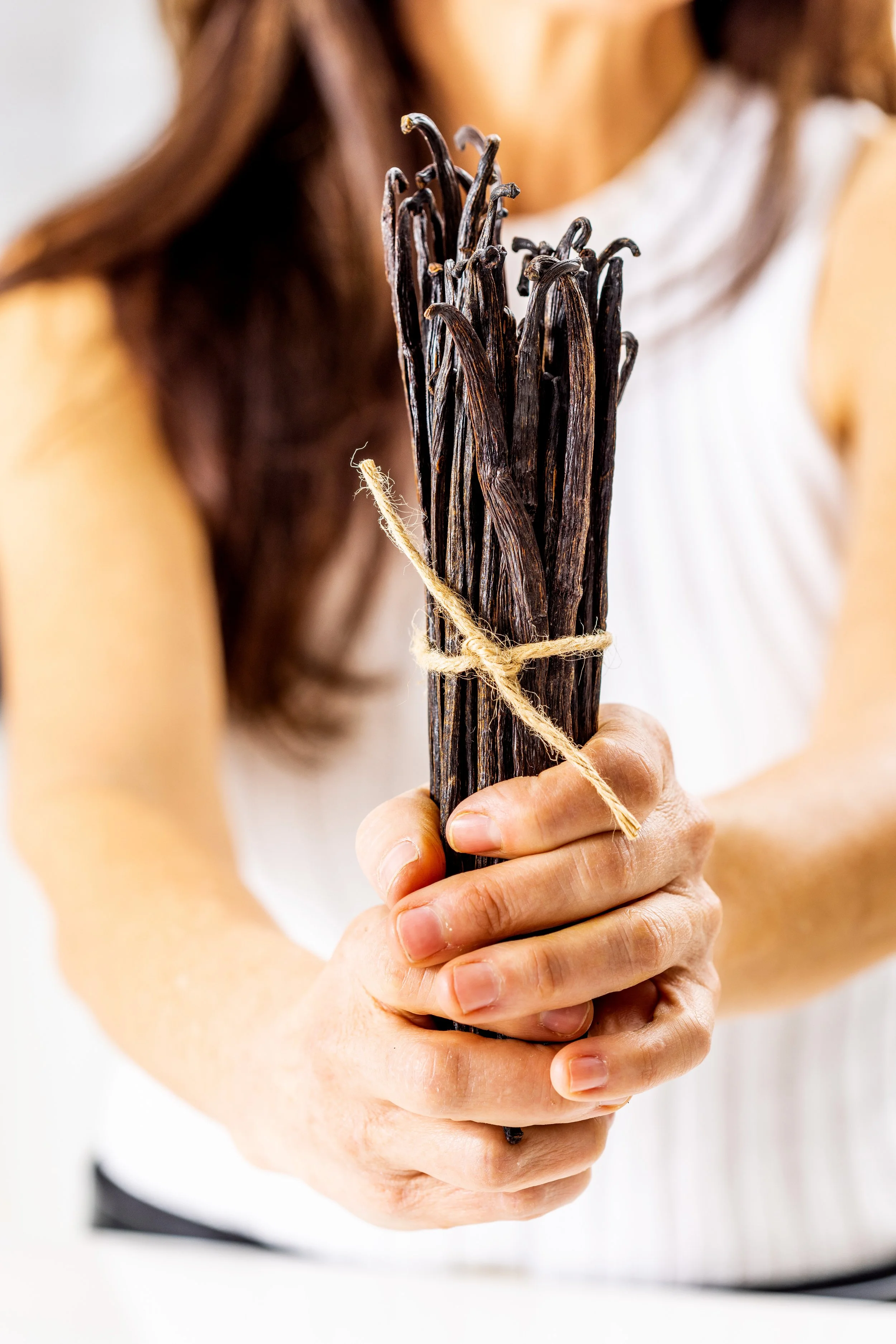 Salt Lake City and Park City Food Photographer - Nick Sokoloff photo of woman holding vanilla beans