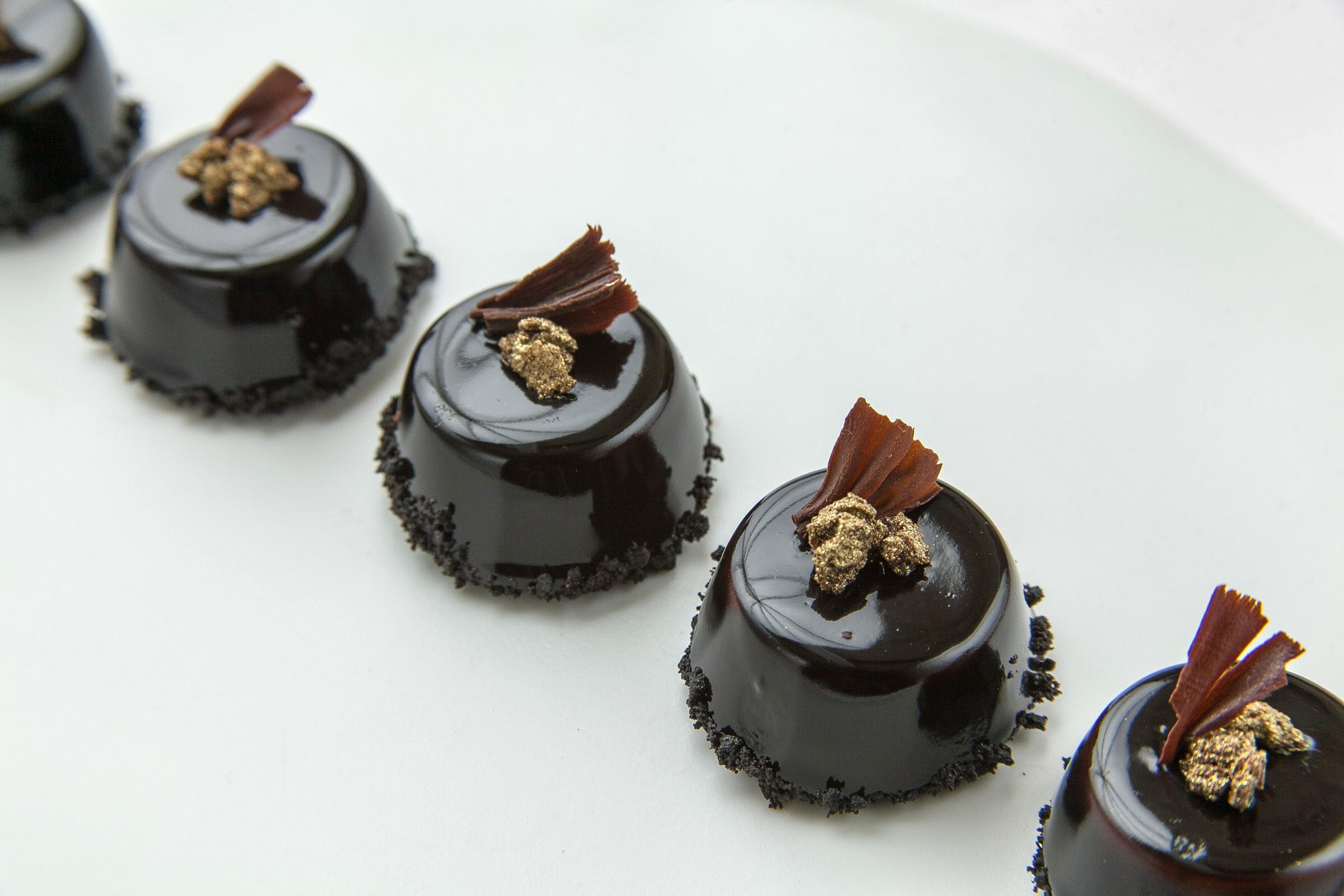 Dark Chocolate Gateau with golden feuilltine nuggets 