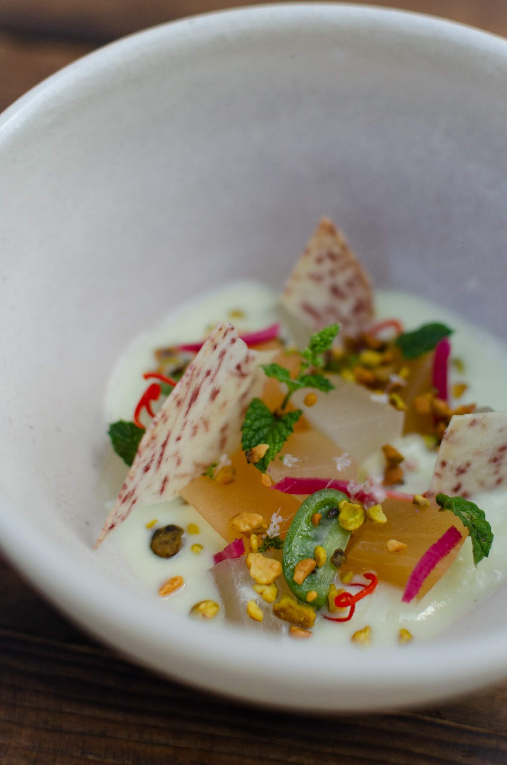 Chilled Heirloom Melon Soup, Kiwi Berries, Taro Chip 