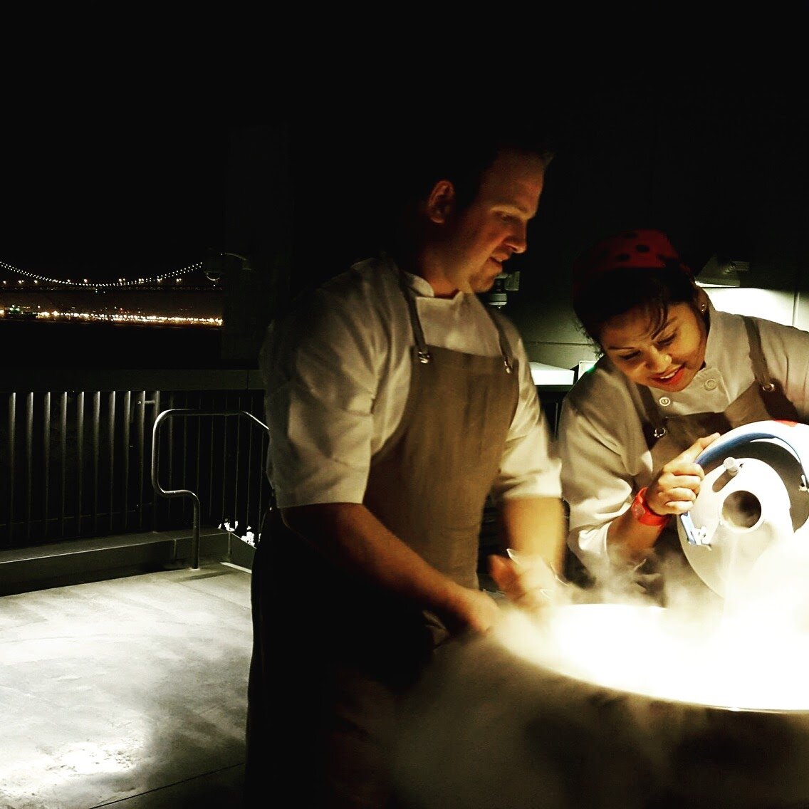  Two chefs making liquid nitrogen ice cream to order in San Francisco 